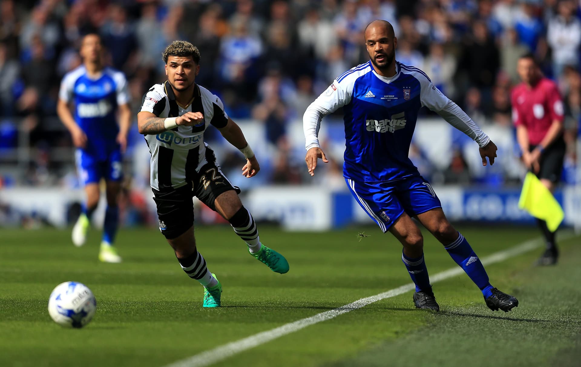 David McGoldrick of Ipswich Town and Deandre Yedlin of Newcastle United