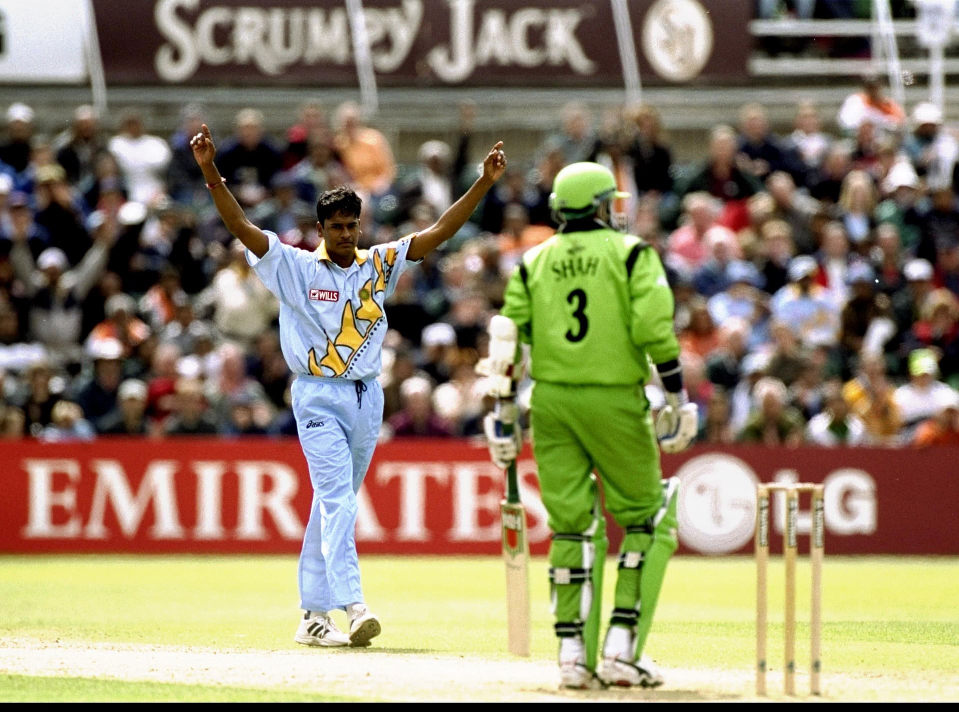 Debashish Mohanty of India claims the wicket of Ravindu Shah of Kenya