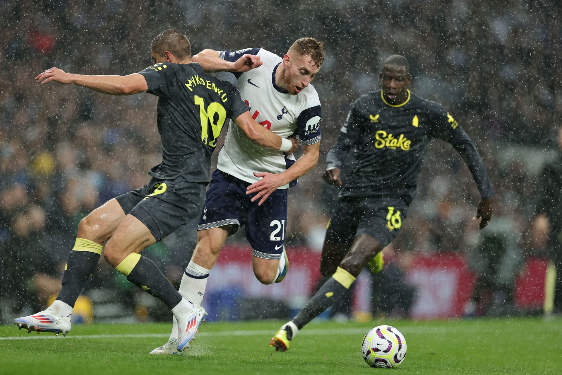 Dejan Kulusevski is challenged by Vitaliy Mykolenko.jpg