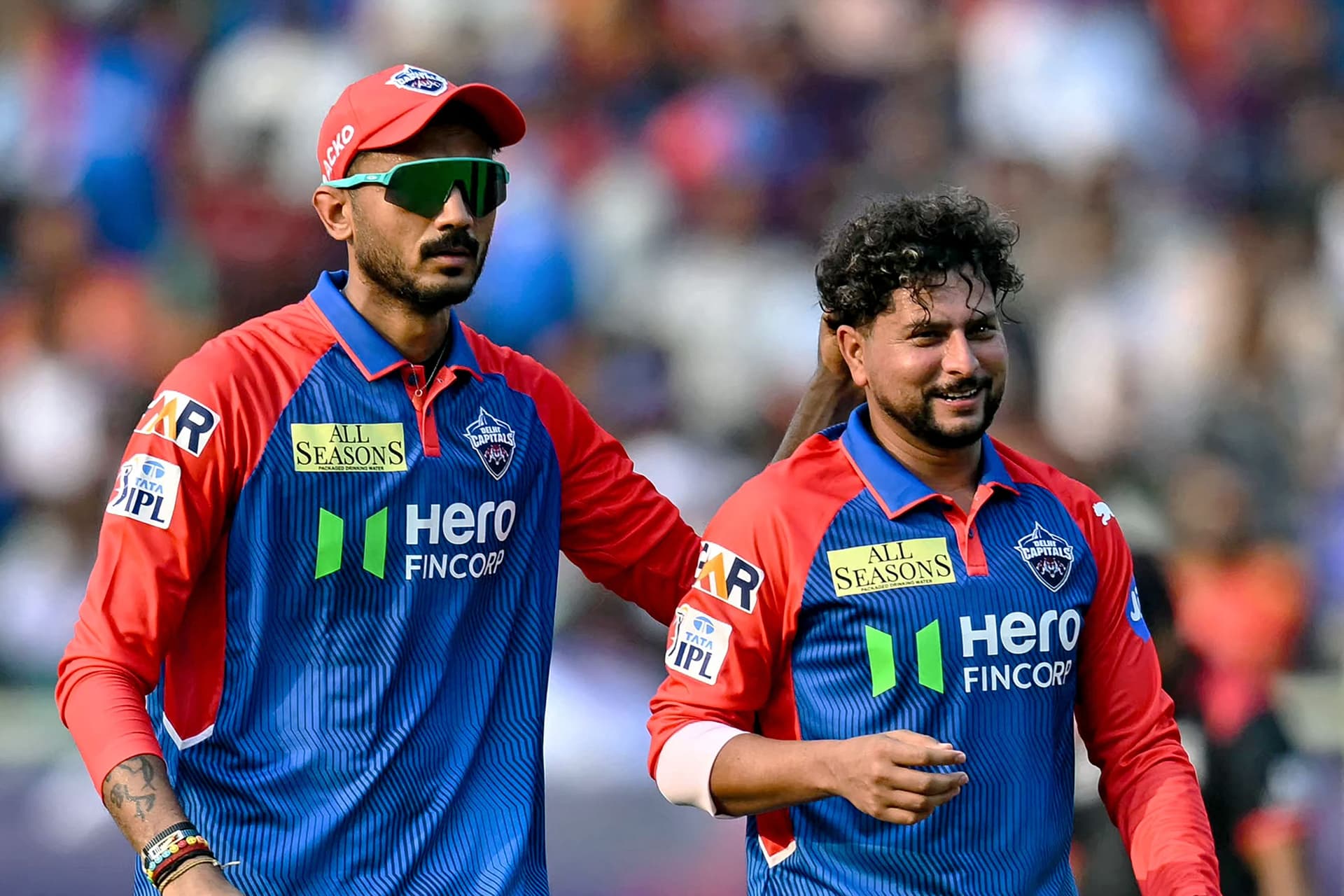 Delhi Capitals' Kuldeep Yadav (R) celebrates with captain Axar Patel