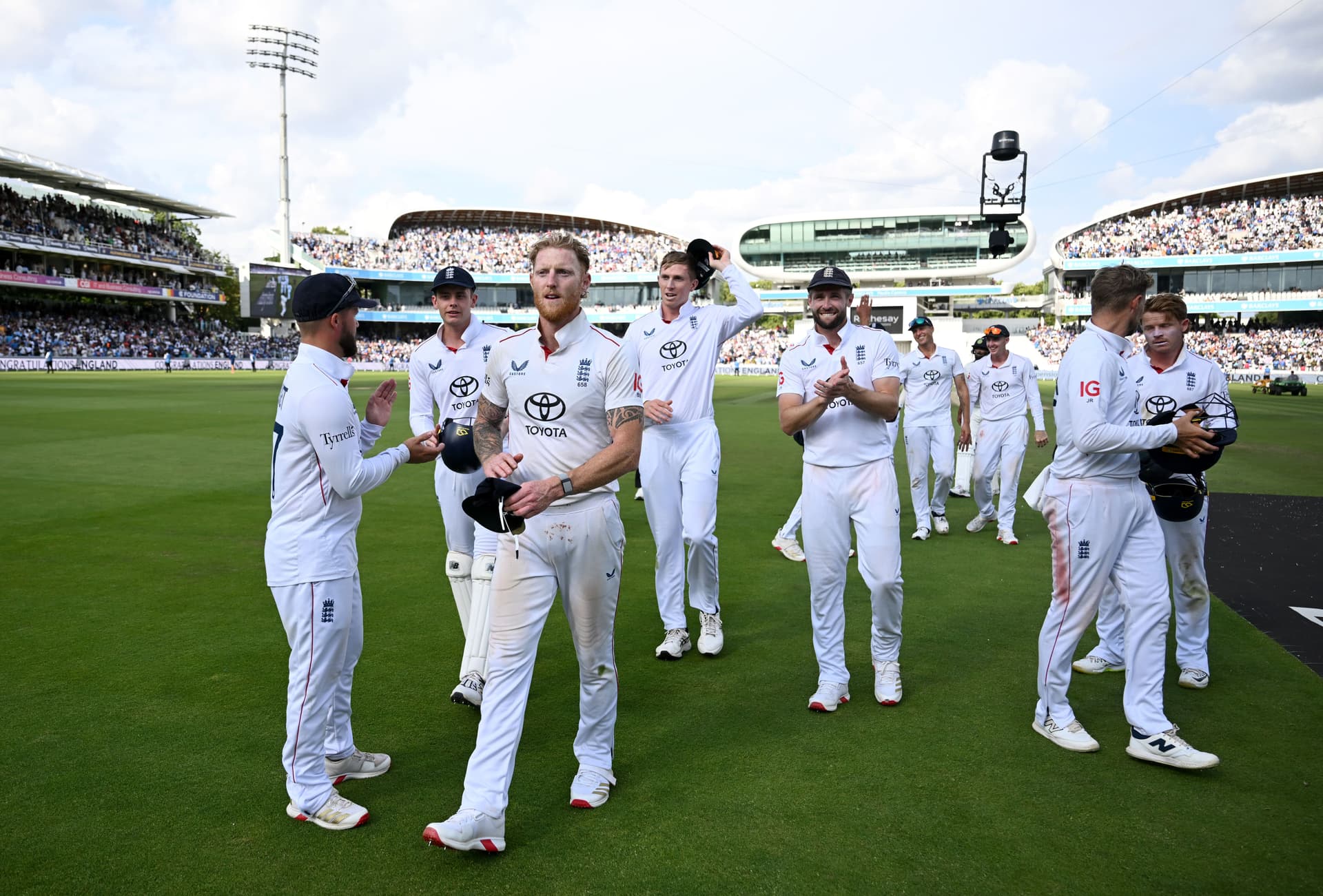 England captain Ben Stokes leaves the field with his team