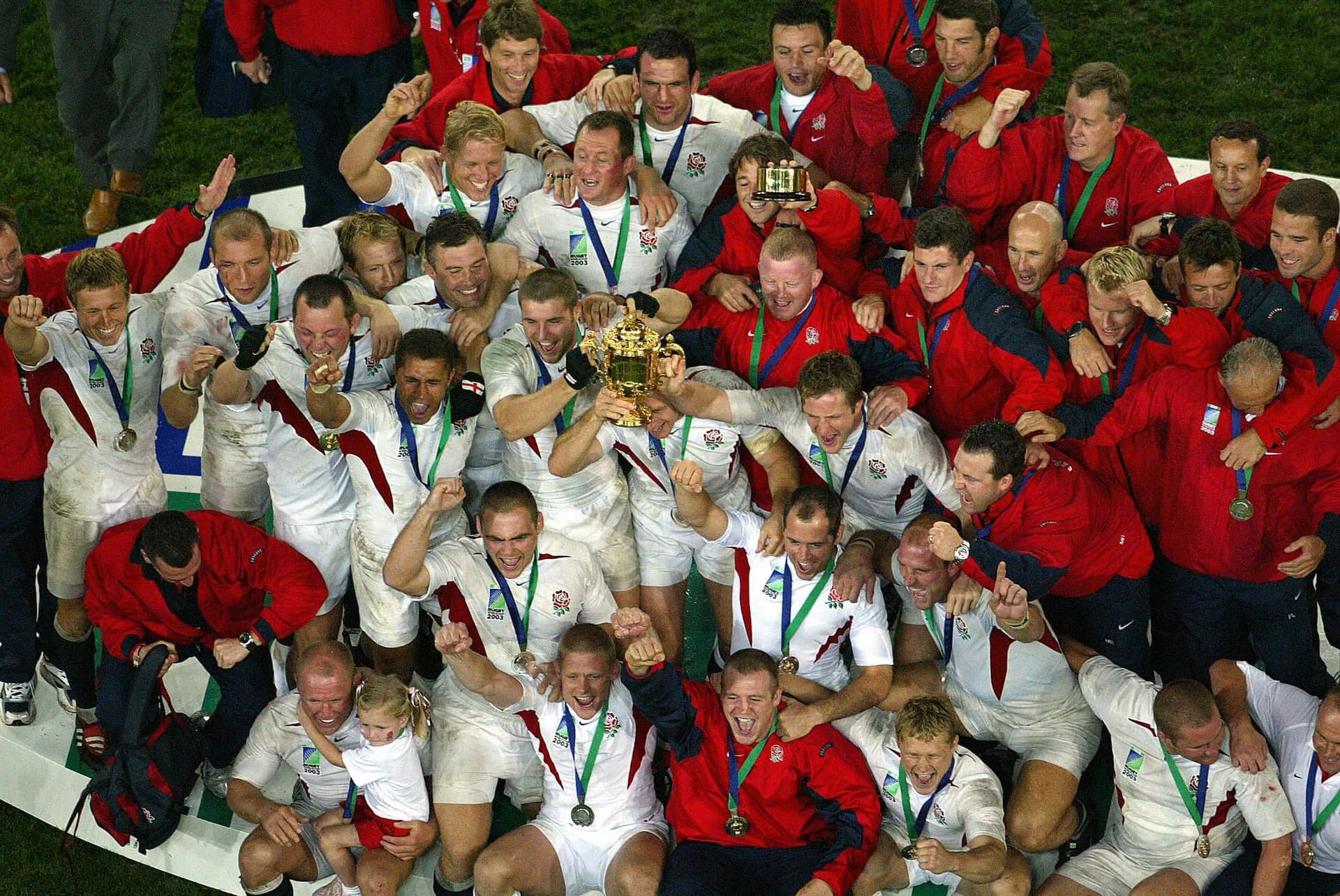 English players celebrate with the William Webb Ellis Cup