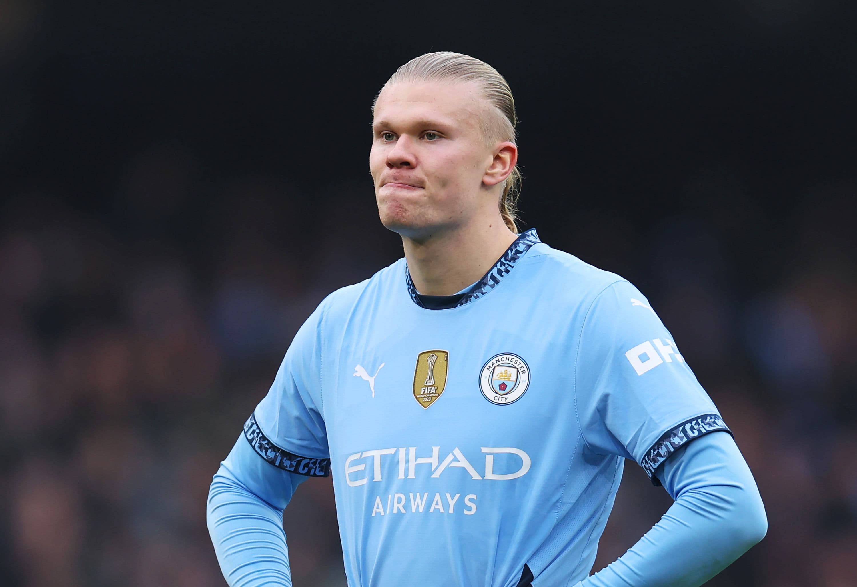 Erling Haaland of Manchester City looks dejected