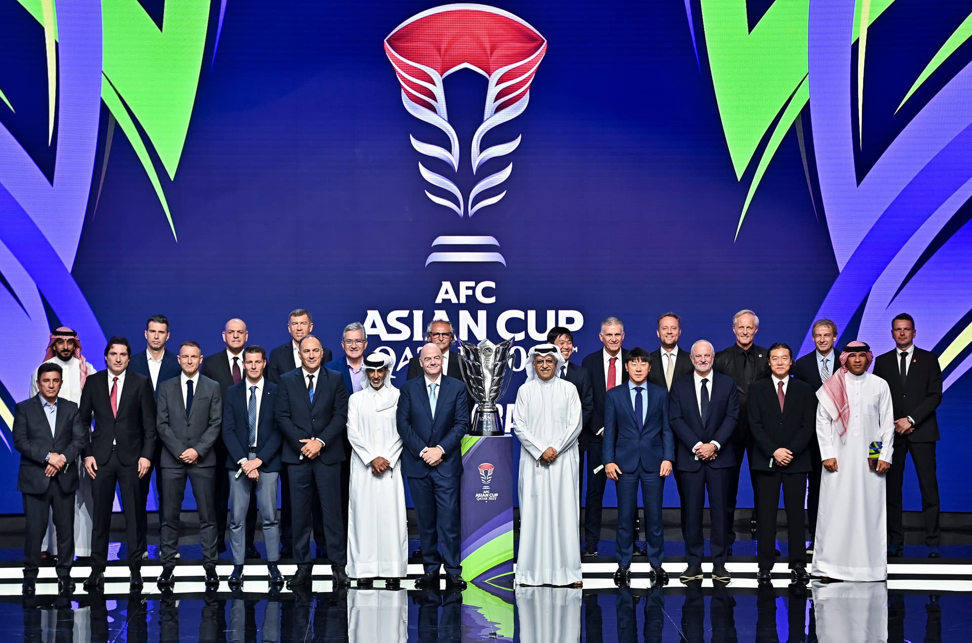 Gianni Infantino and Sheikh Salman bin Ibrahim al-Khalifa pose for a picture with the trophy