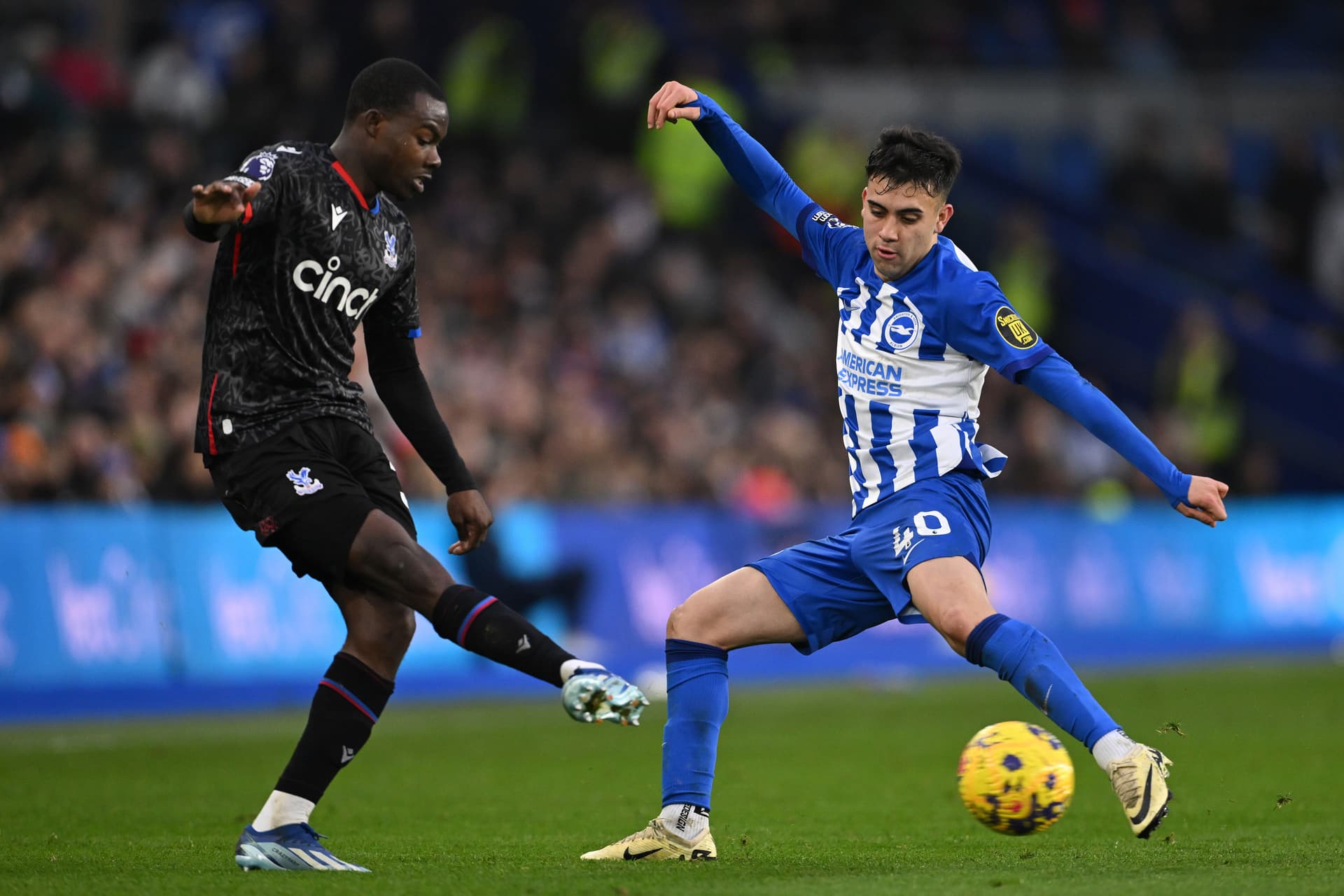 Facundo Buonanotte of Brighton challenges Tyrick Mitchell of Crystal Palace