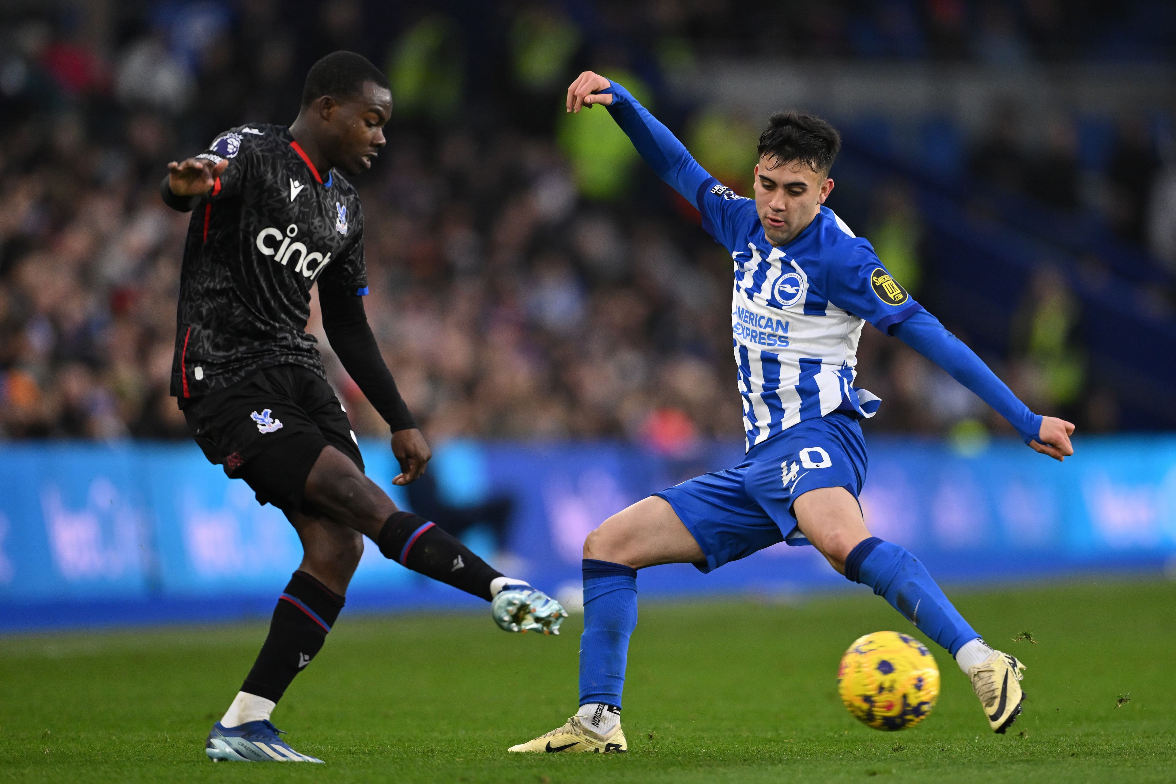 Facundo Buonanotte of Brighton challenges Tyrick Mitchell of Crystal Palace