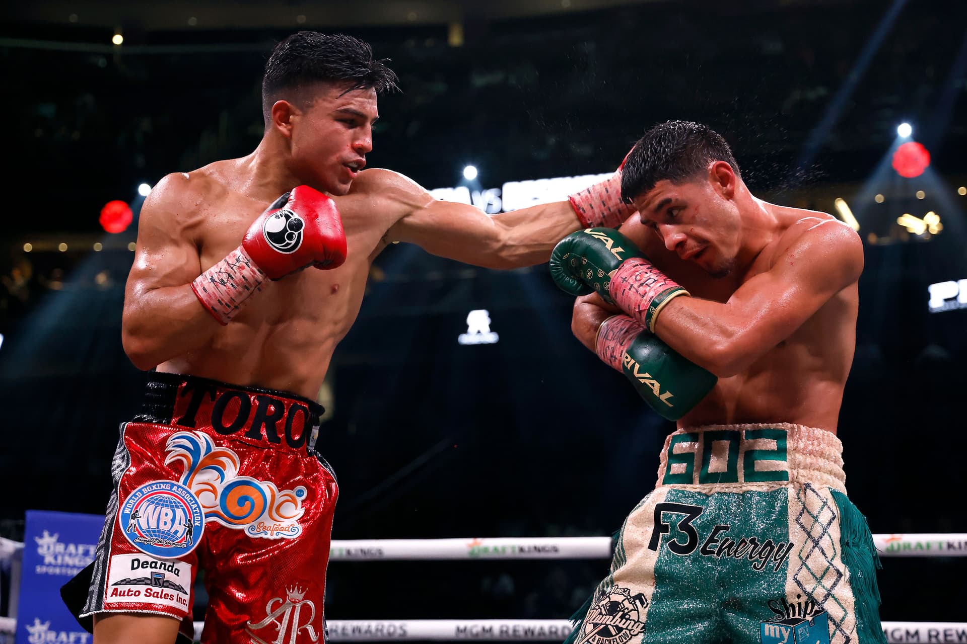 Garcia trades punches Armando Resendiz of Mexico during their middleweight fight.jpg