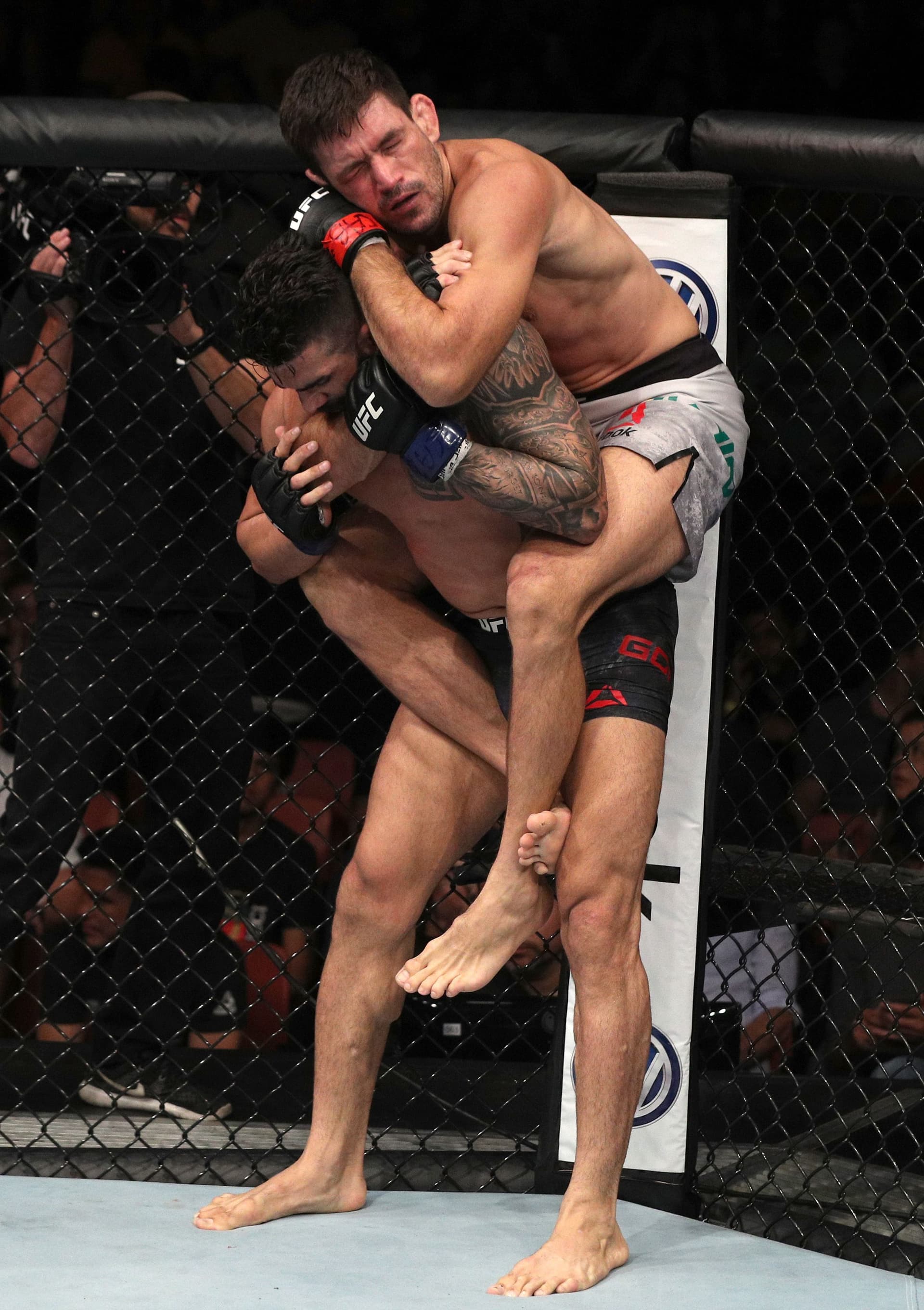 Demian Maia of Brazil attempts to secure a rear choke submission against Lyman Good
