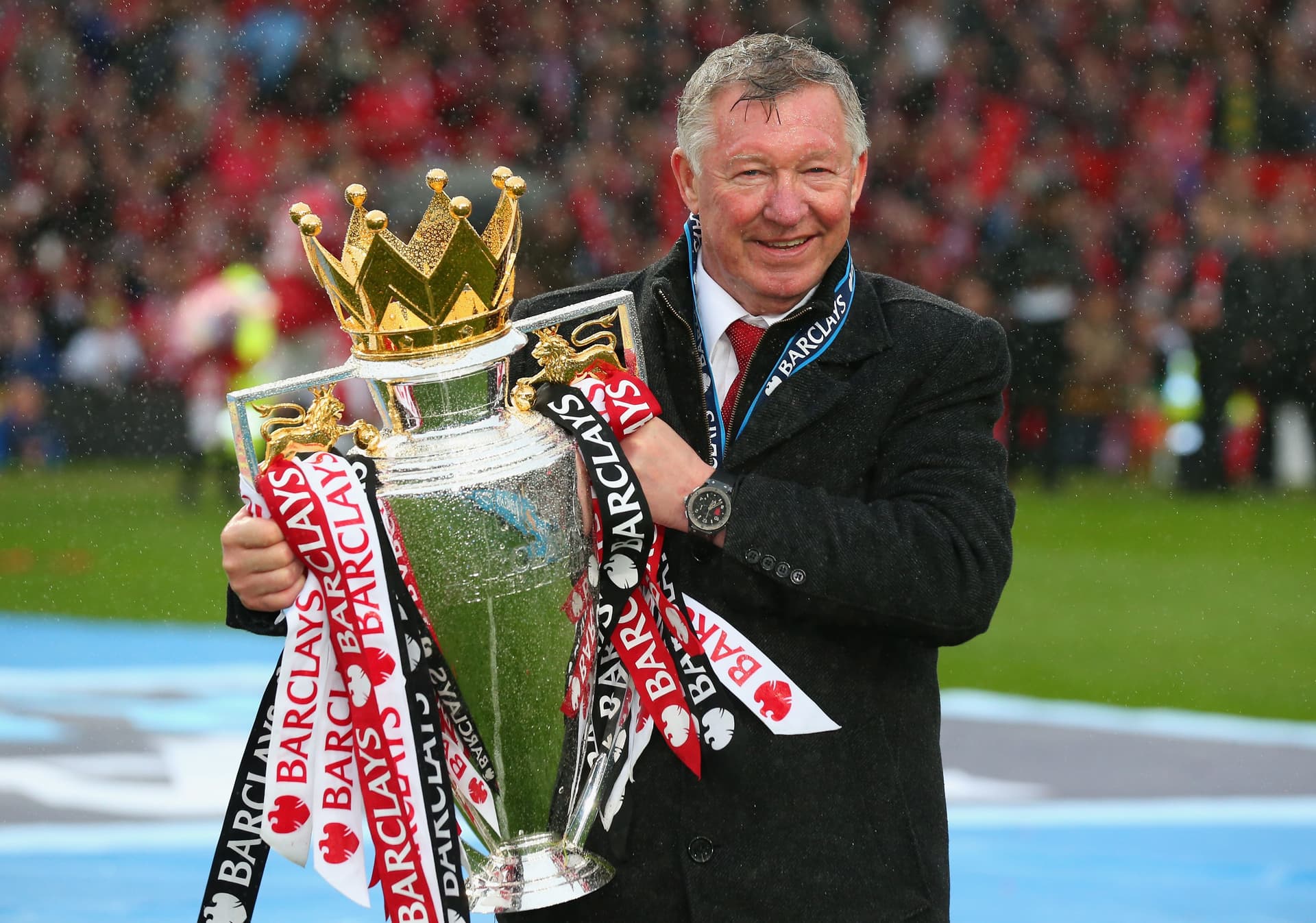 Manchester United Manager Sir Alex Ferguson celebrates with the Premier League