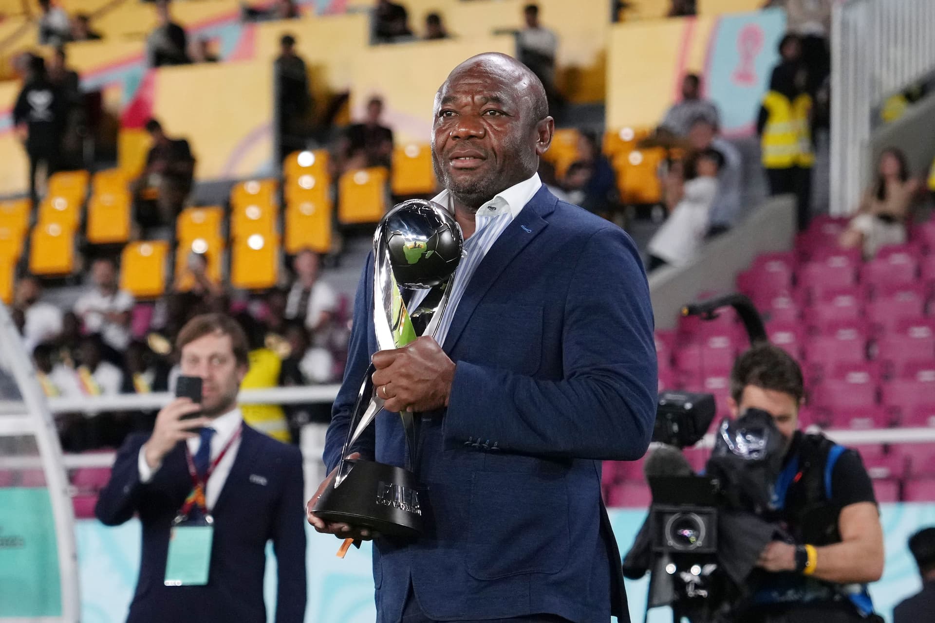 Emmanuel Amuneke walks out with the FIFA U-17 World Cup winners trophy prior to the FIFA U-17 World Cup Final