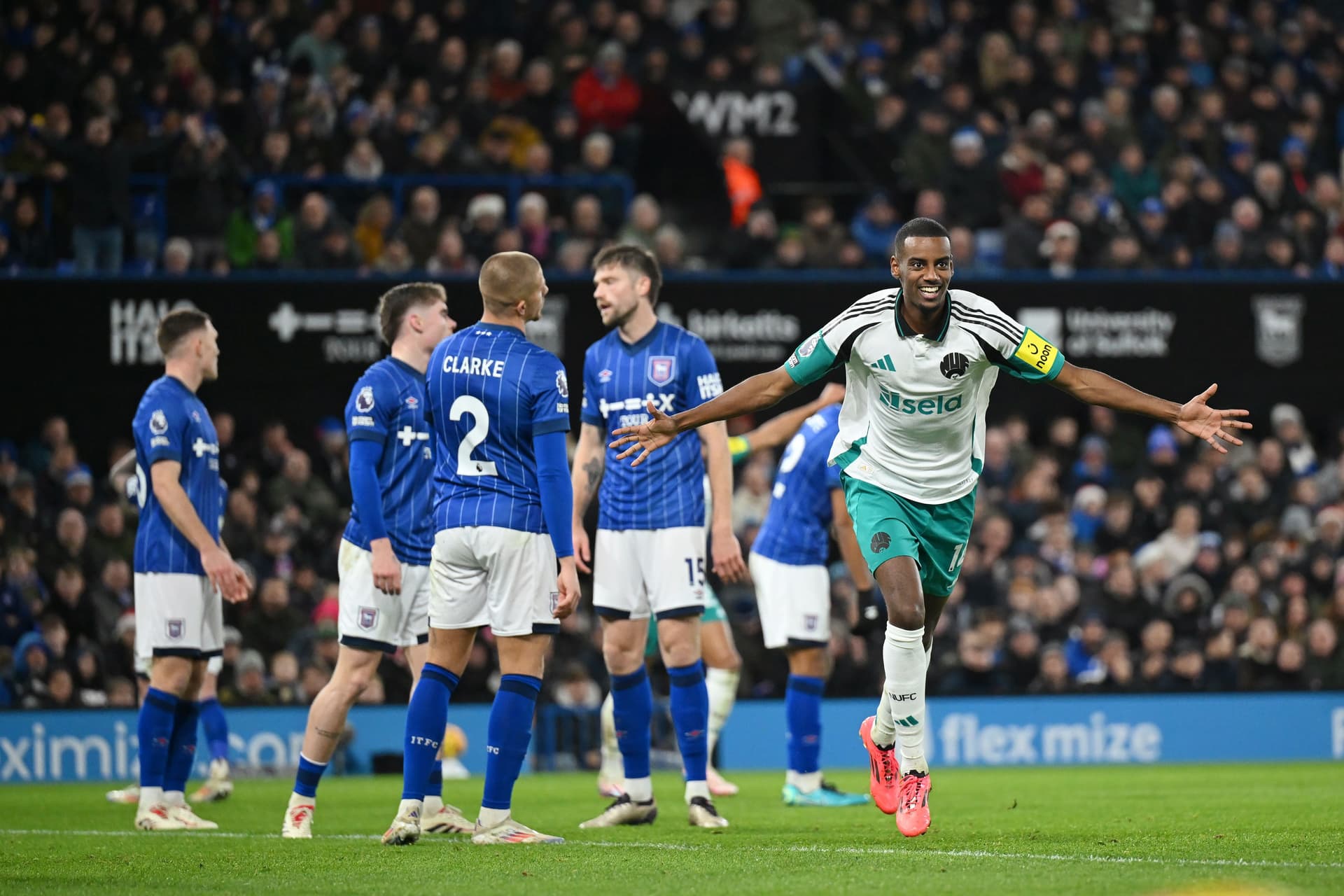 Alexander Isak of Newcastle celebrates scoring a hat-trick to make it 4-0