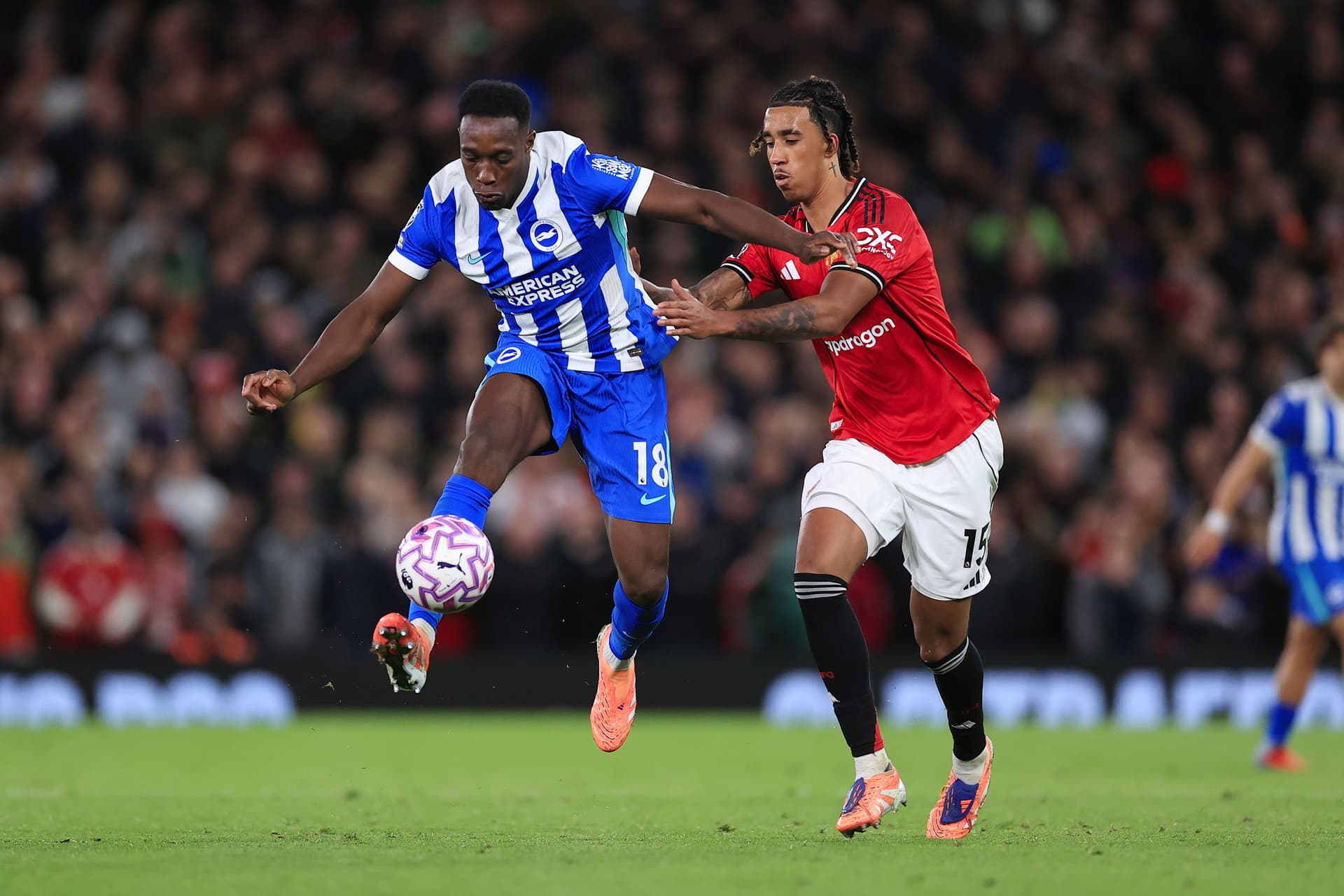 Danny Welbeck of Brighton & Hove Albion battles