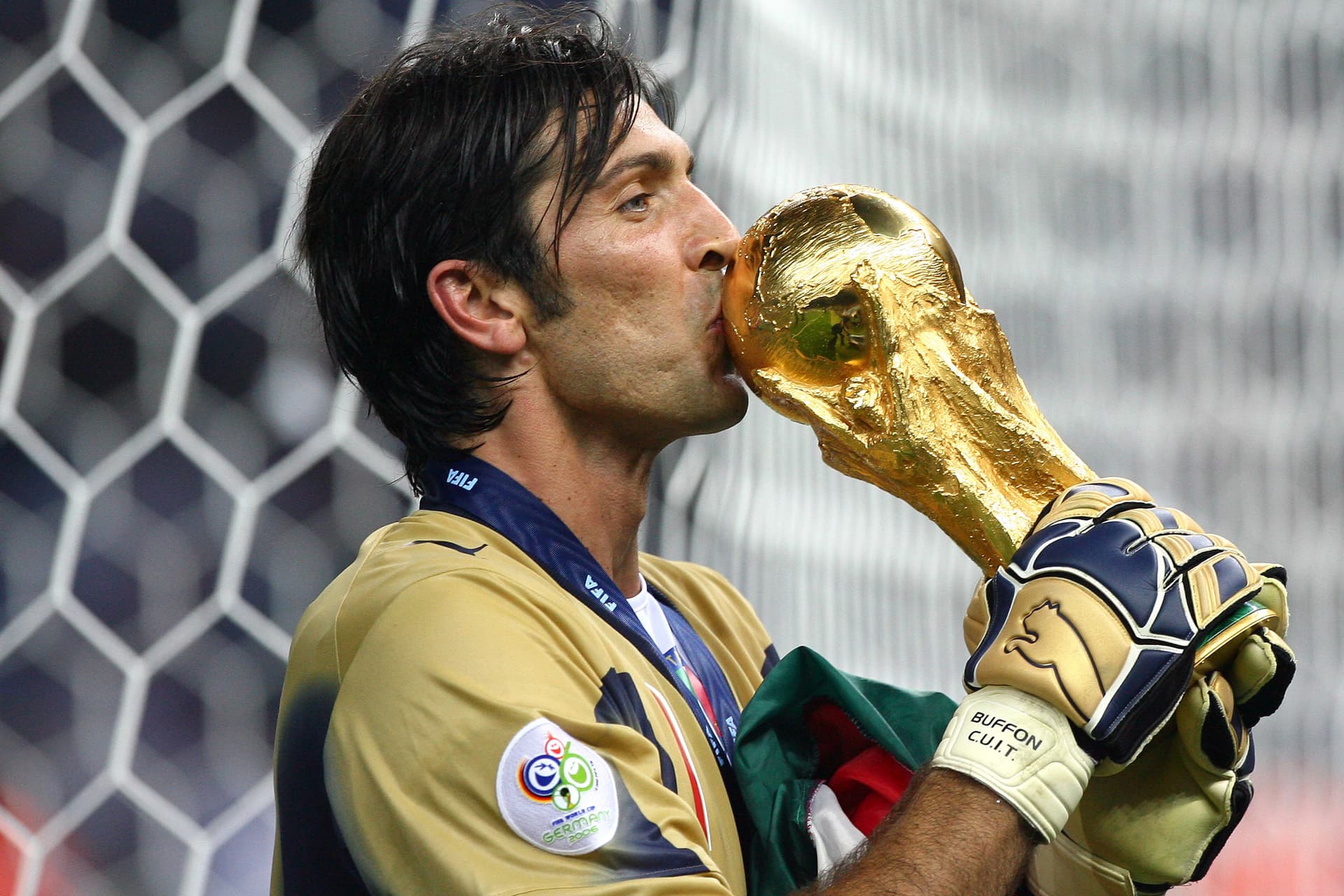 Gianluigi Buffon celebrates with FIFA World trophy
