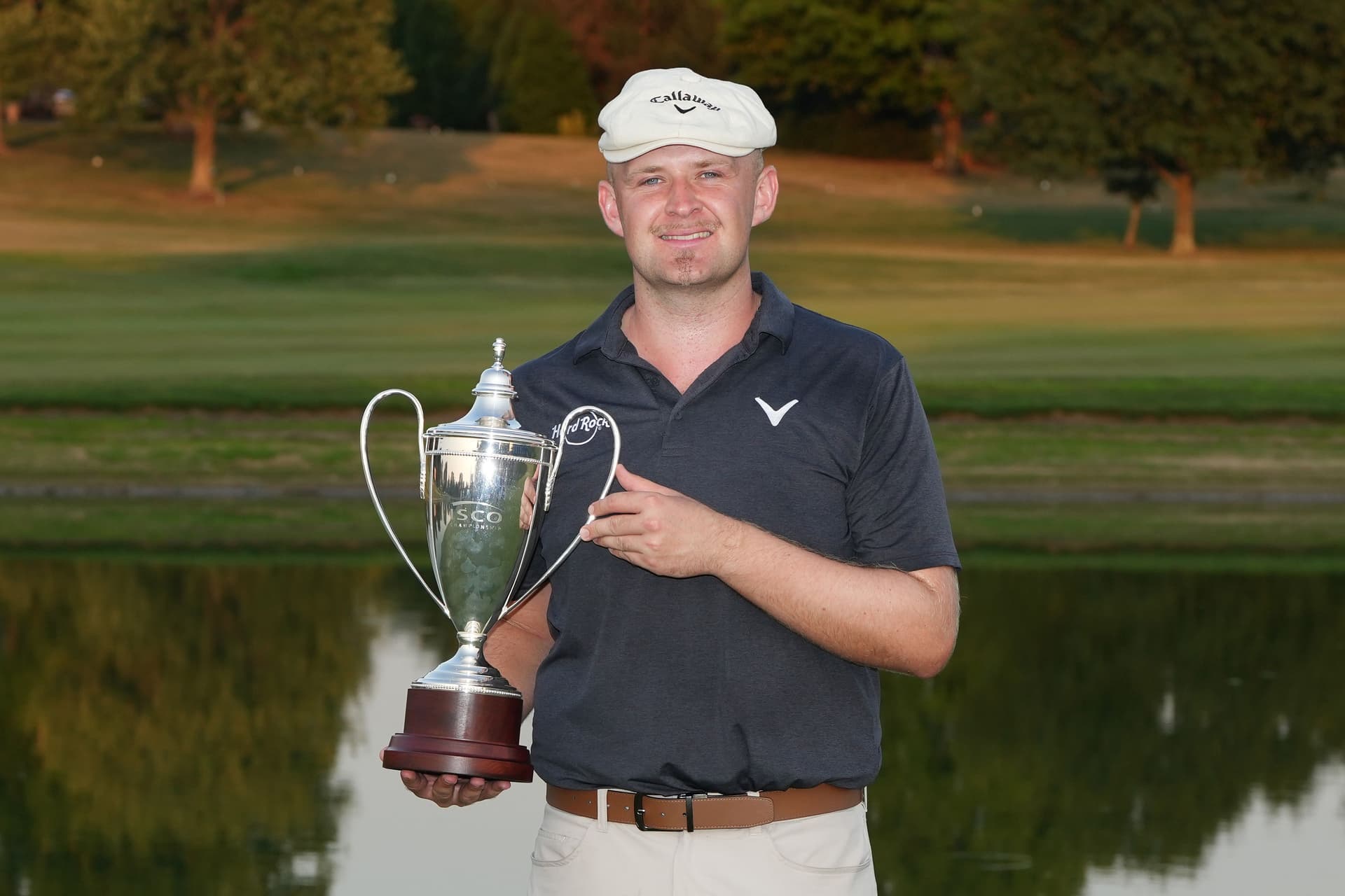 Harry Hall of England poses with the trophy after winning the ISCO Championship