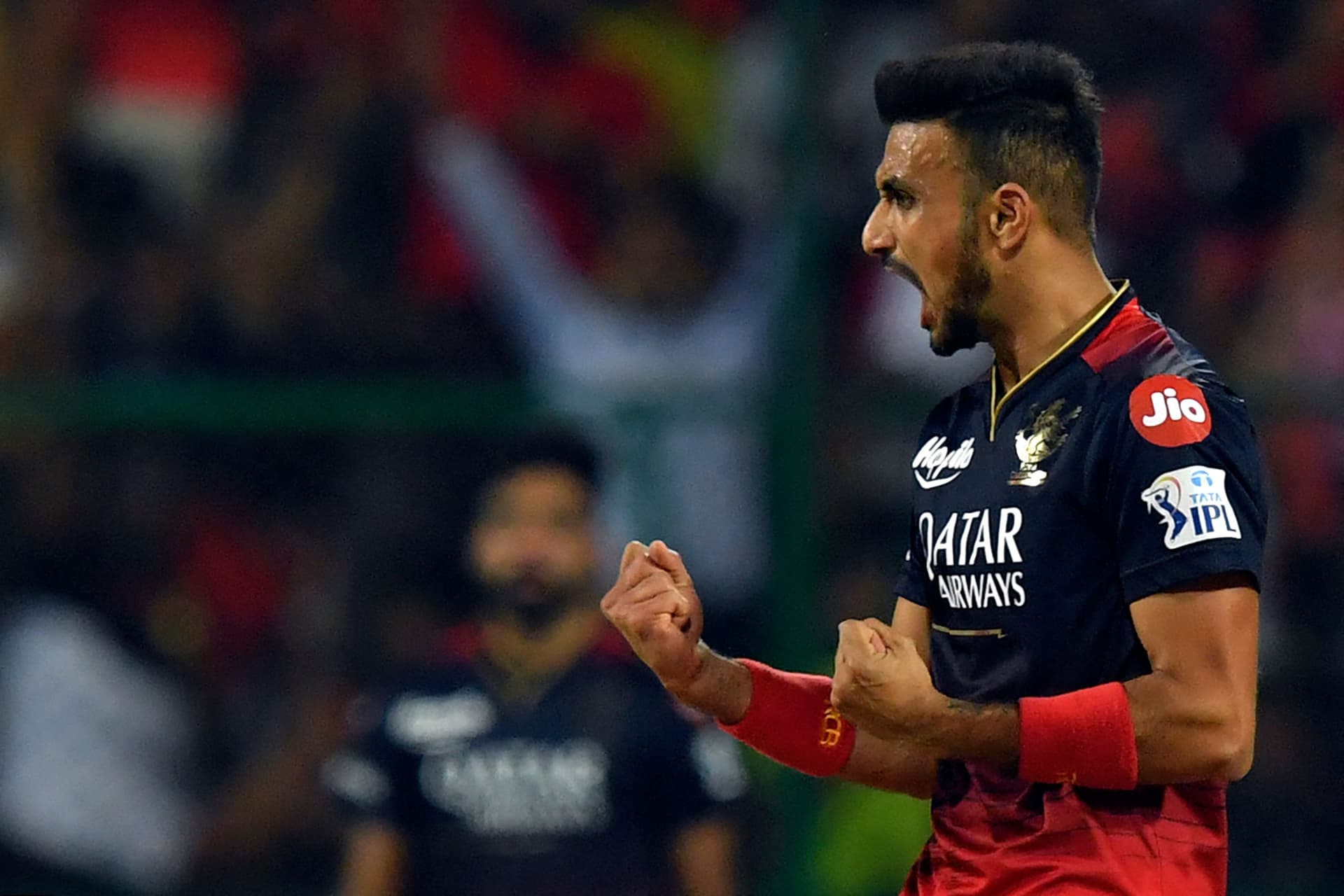 Harshal Patel celebrates after the dismissal of Chennai Super Kings' Devon Conway.jpg