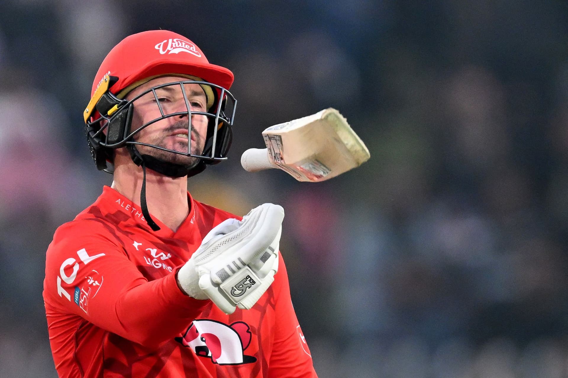 Islamabad United's Colin Munro walks back to the pavilion