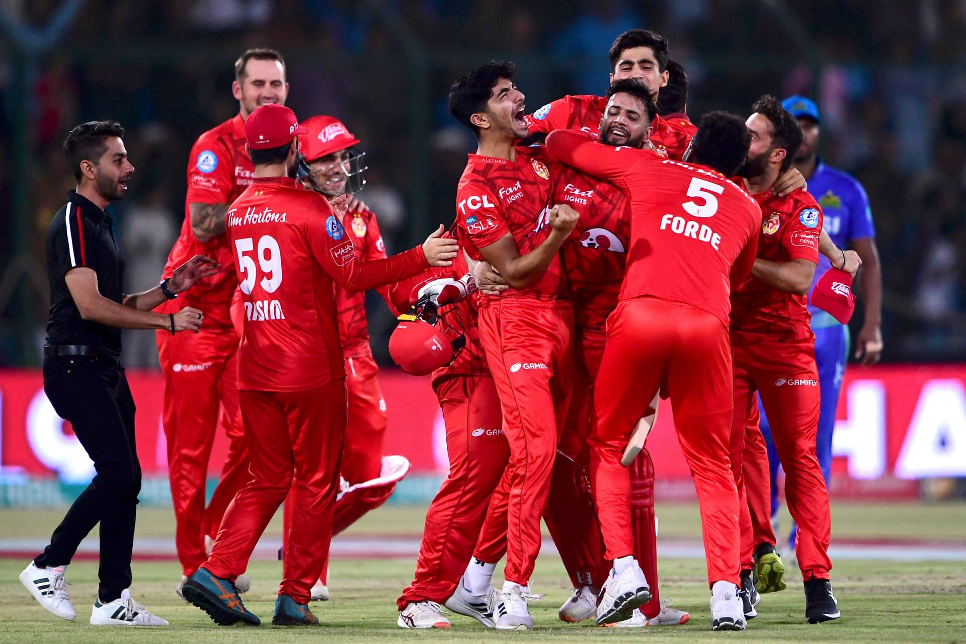 Islamabad United's players celebrate their victory