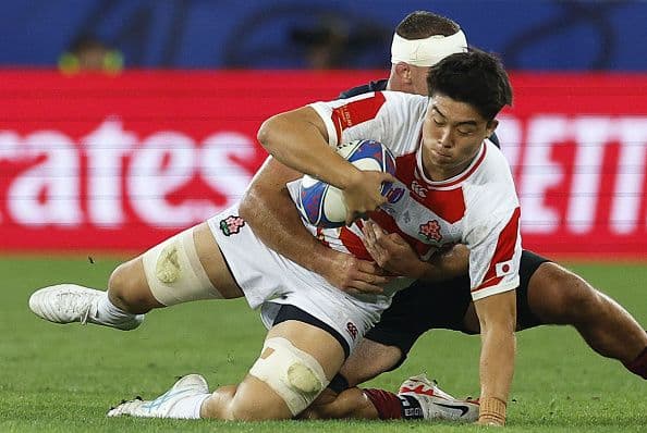 Japan's Kanji Shimokawa holds onto the ball during the second half of a Rugby World Cup