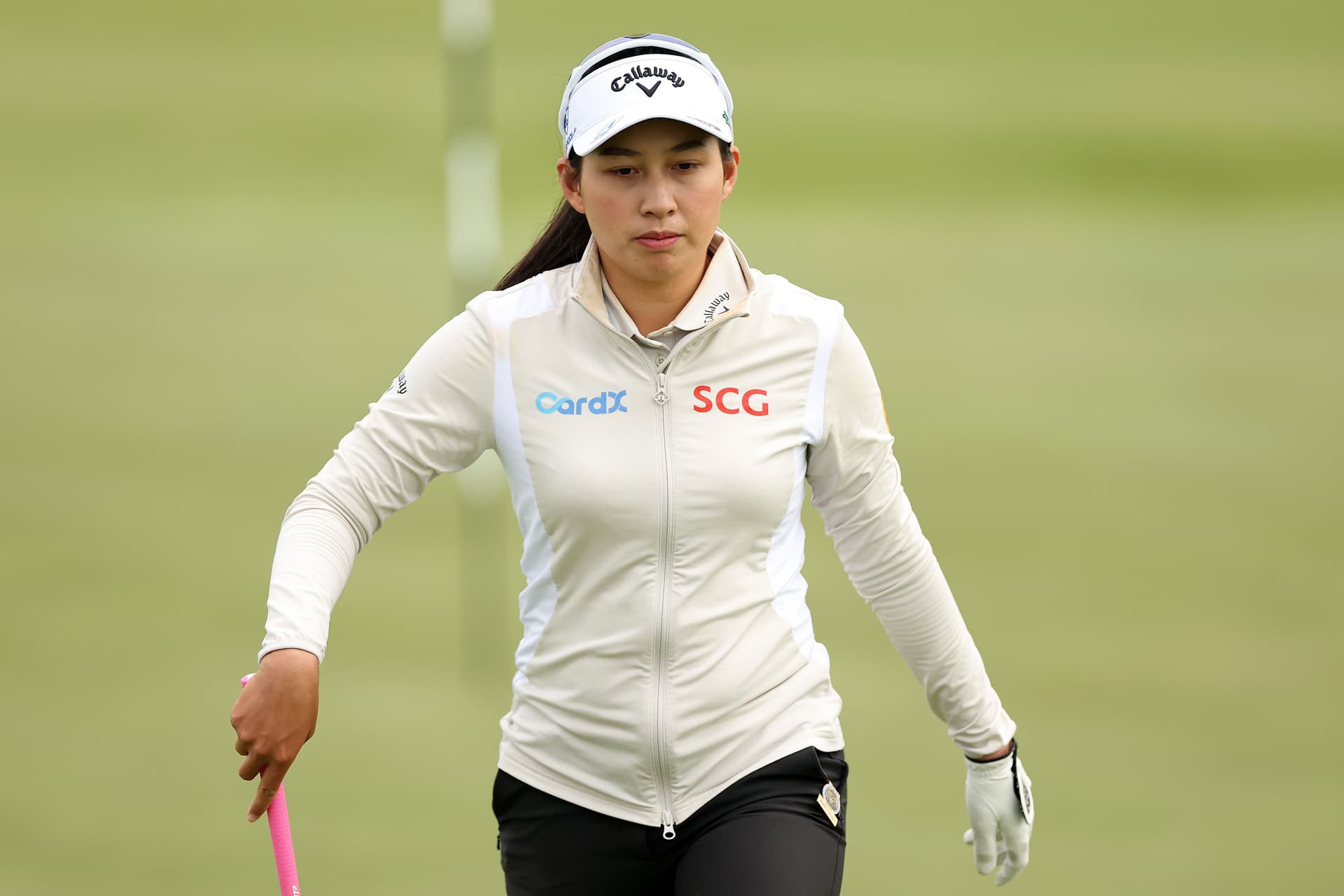 Jeeno Thitikul walks across the sixth green prior to the U.S. Women's Open.jpg