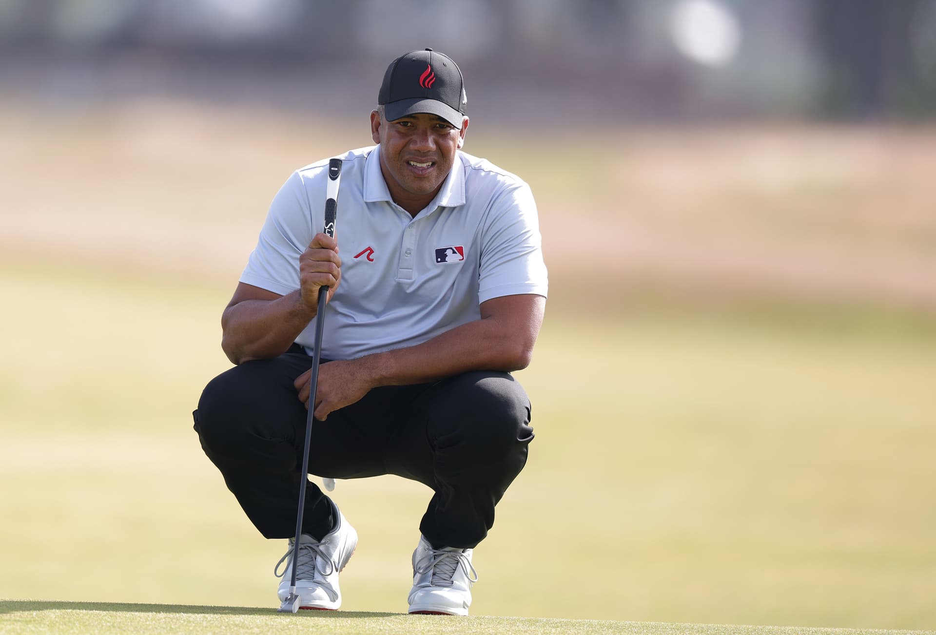 Jhonattan Vegas of Venezuela lines up a putt on the fifth green on day one
