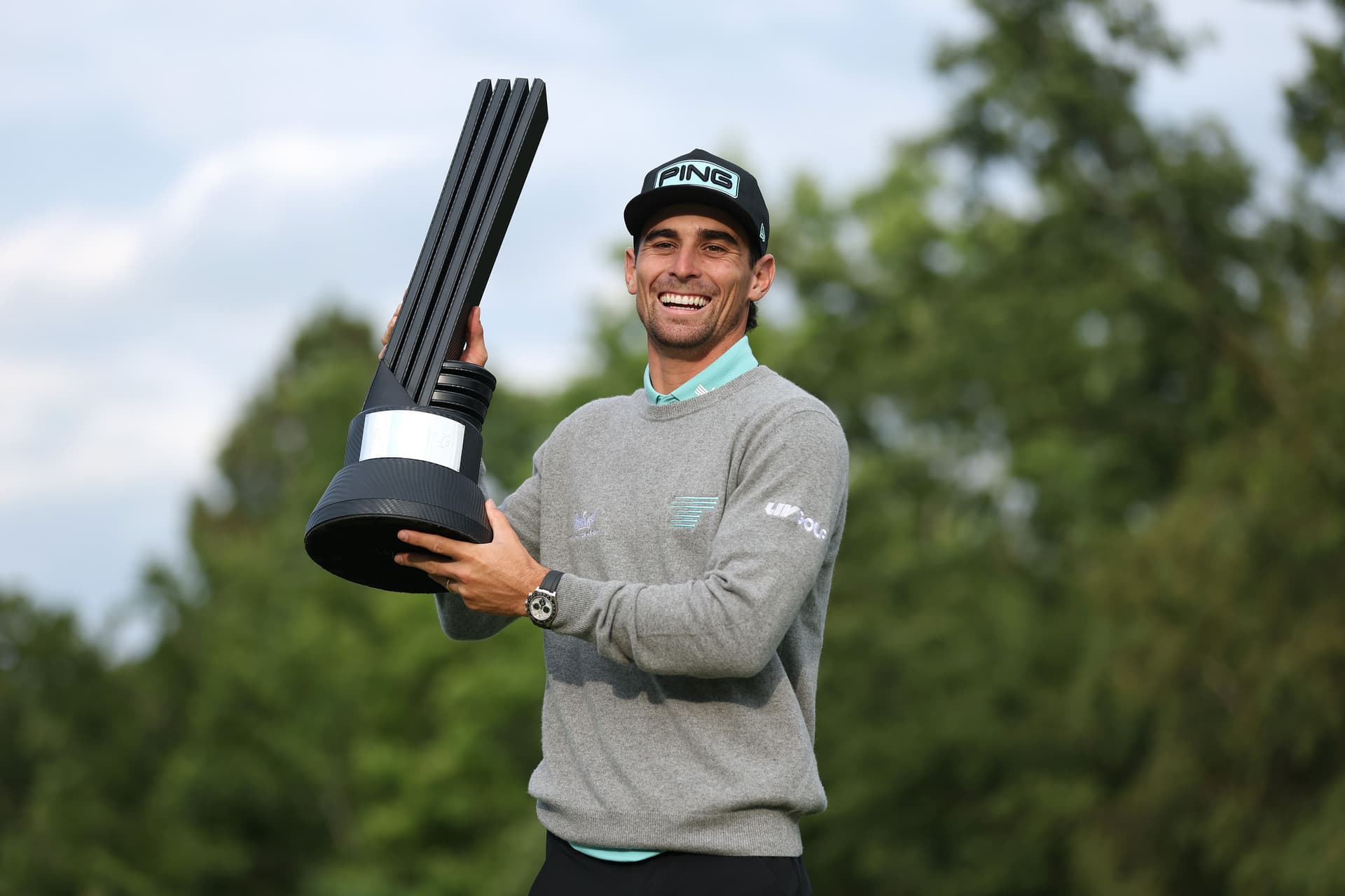 Joaquin Niemann of Torque GC poses with the individual trophy