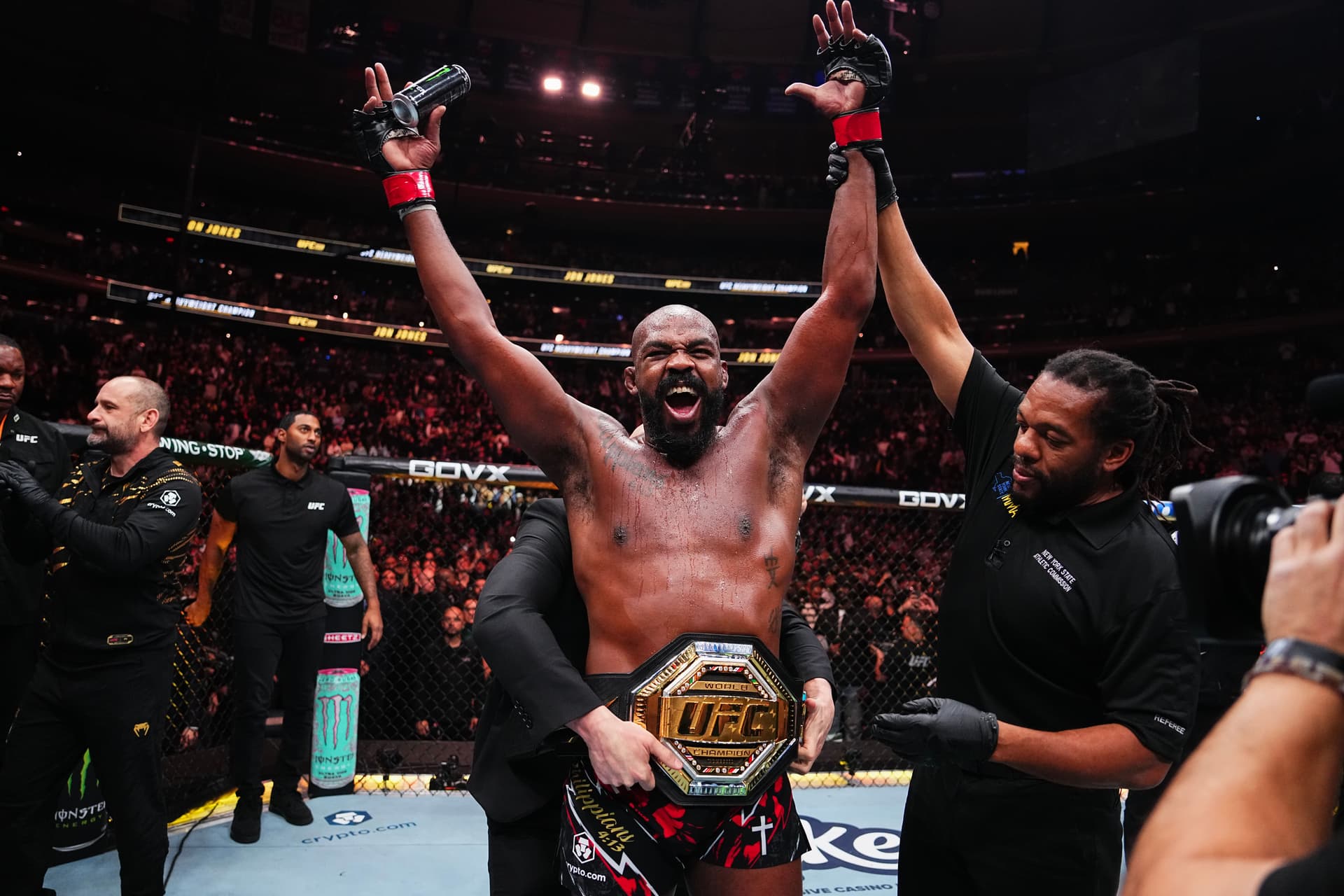 Jon Jones of the United States of America reacts after his TKO victory