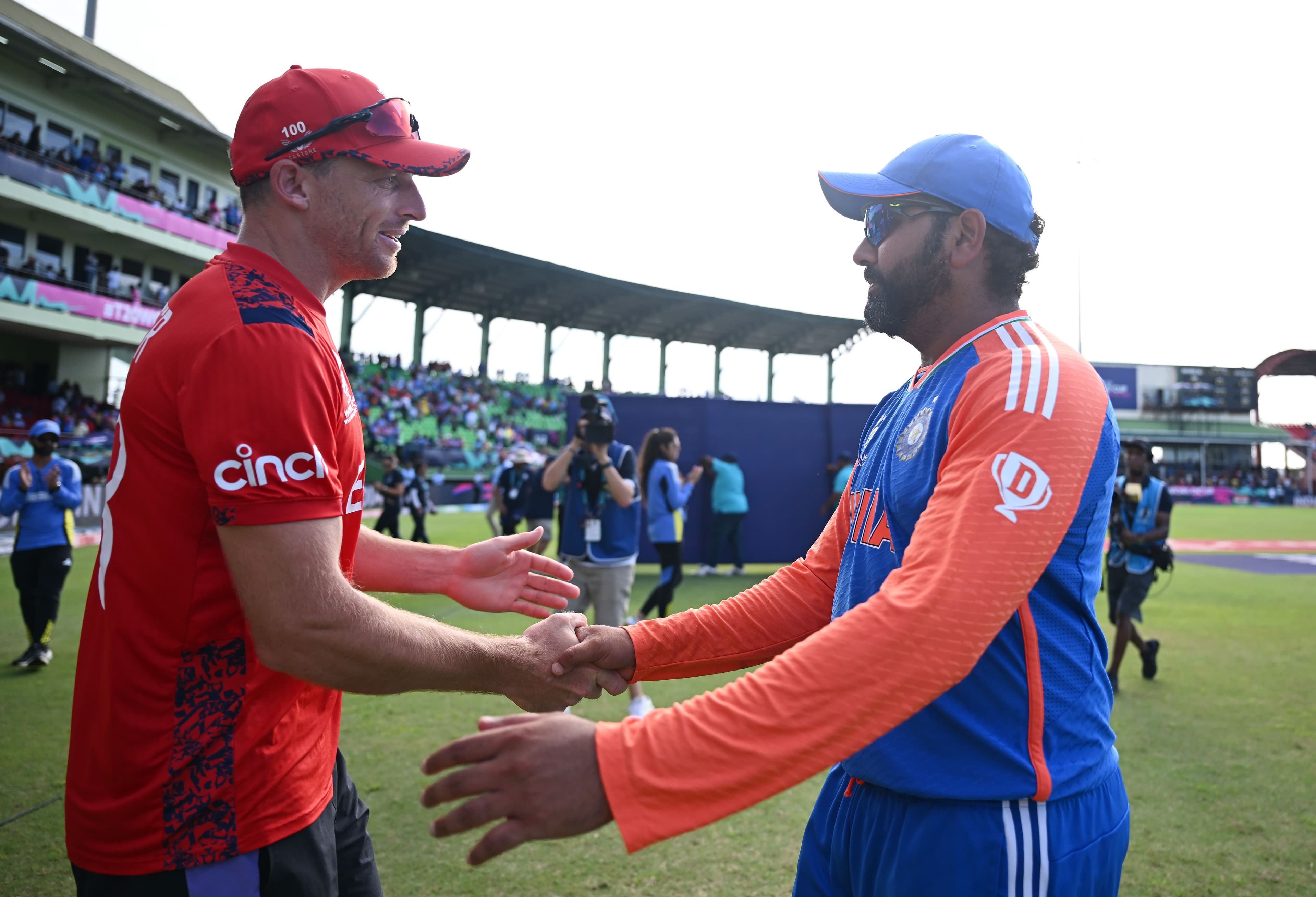 Jos Buttler of England (L) and Rohit Sharma of India shake hands after the ICC Men's T20 Cricket World Cup.jpg