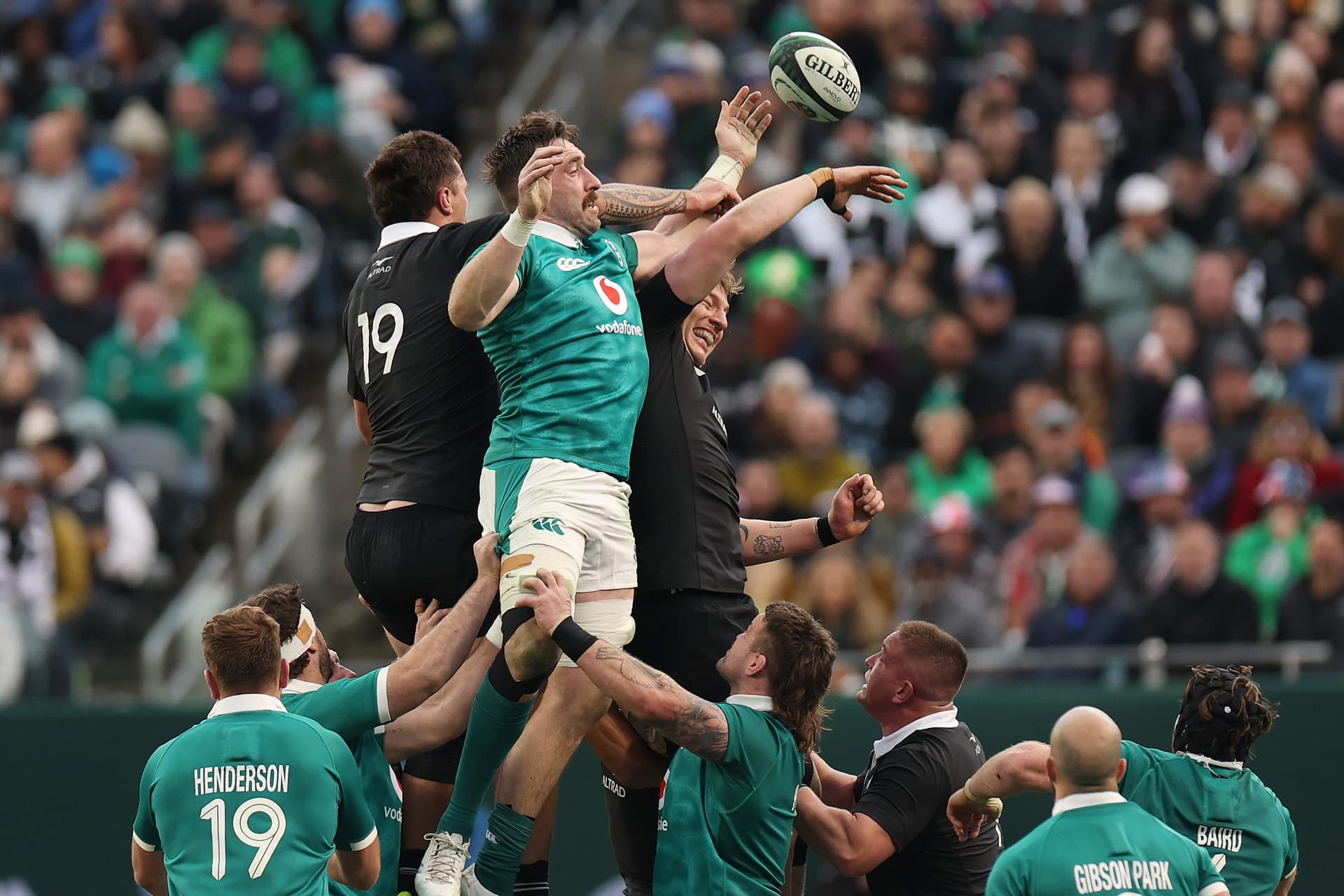 Josh Lord and Beauden Barrett of the All Blacks battle for a lineout with Jack Conan