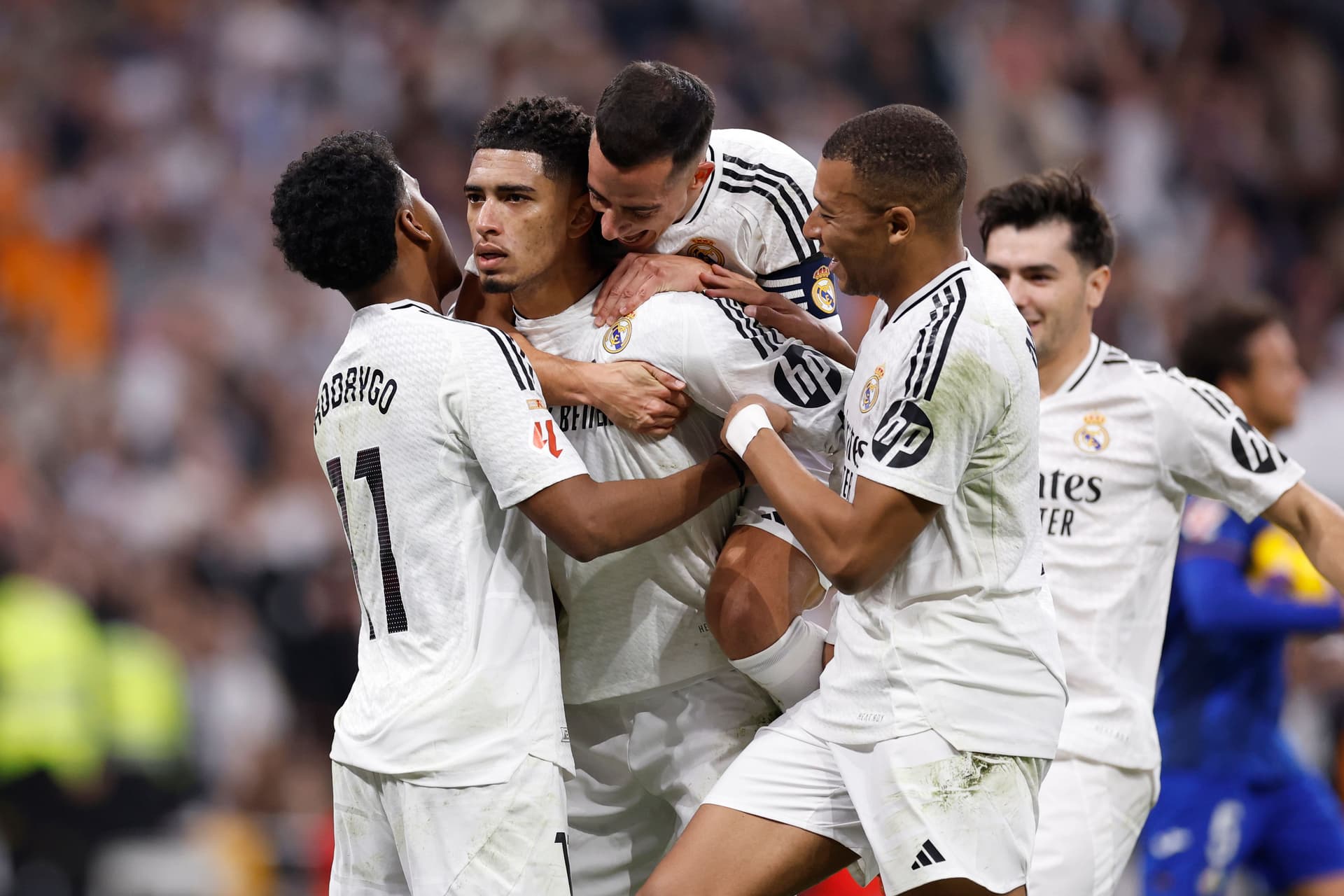 Jude Bellingham player of Real Madrid celebrates with his teammates