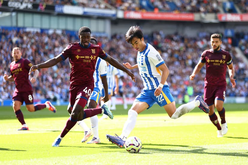 Kaoru Mitoma & Hove Albion is challenged by Axel Tuanzebe