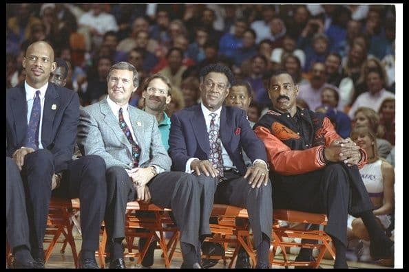 Kareem Abdul-Jabbar, Jerry West, Elgin Baylor and Wilt Chamberlain sit on the court