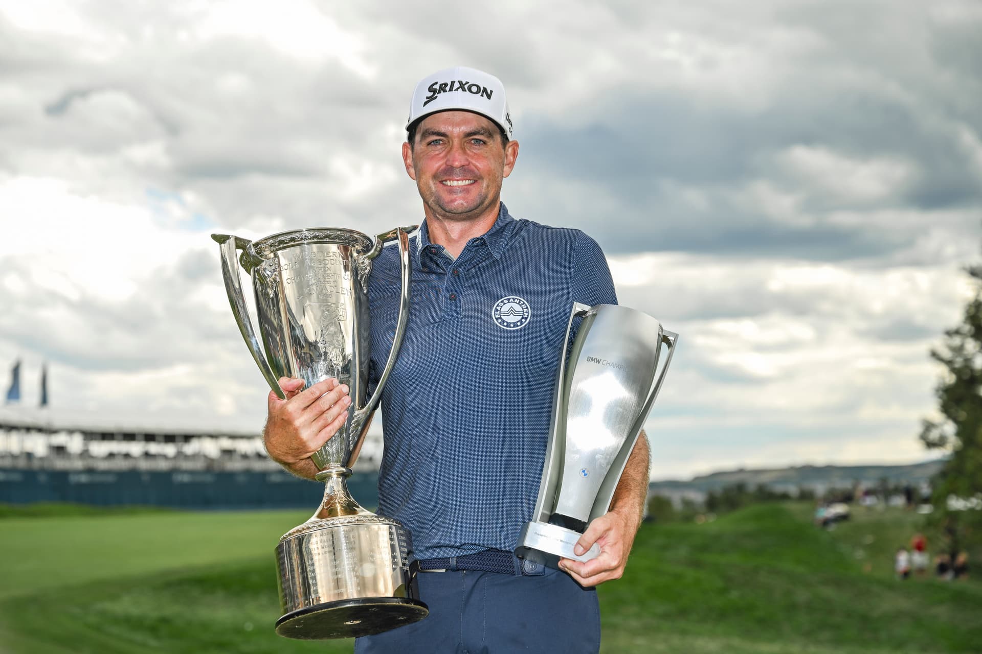 Keegan Bradley smiles and walks with the Western Golf Association (WGA)