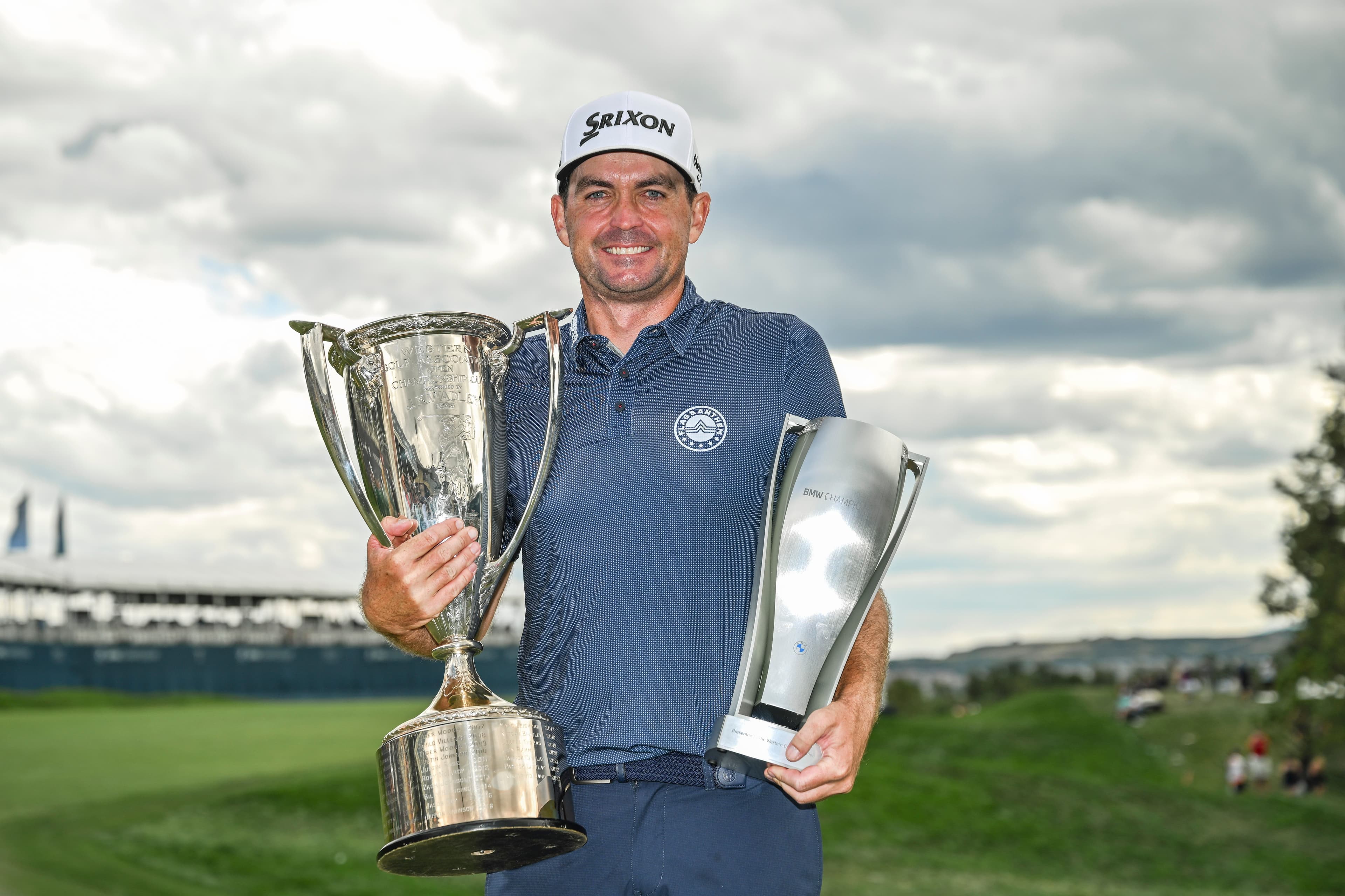 Keegan Bradley smiles and walks with the Western Golf Association (WGA)