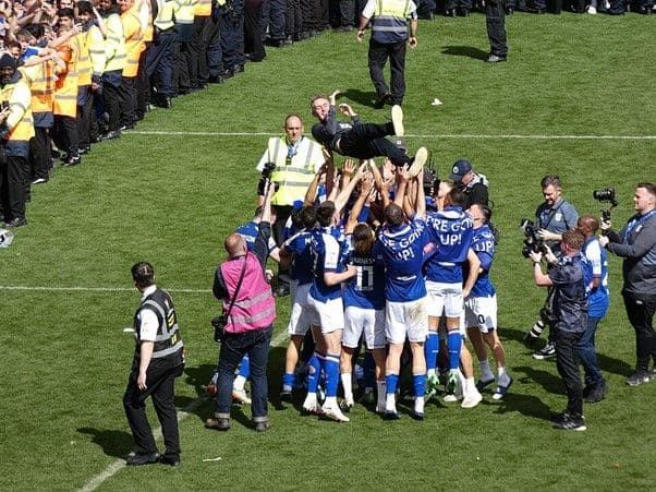 Kieran McKenna is thrown into the air by his Ipswich Town players at Portman Road after Ipswich sealed back-to-back promotions