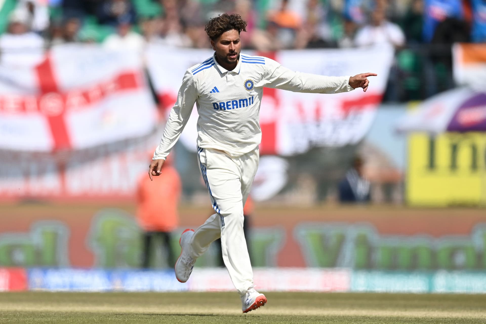 Kuldeep Yadav of India celebrates dismissing England captain Ben Stokes