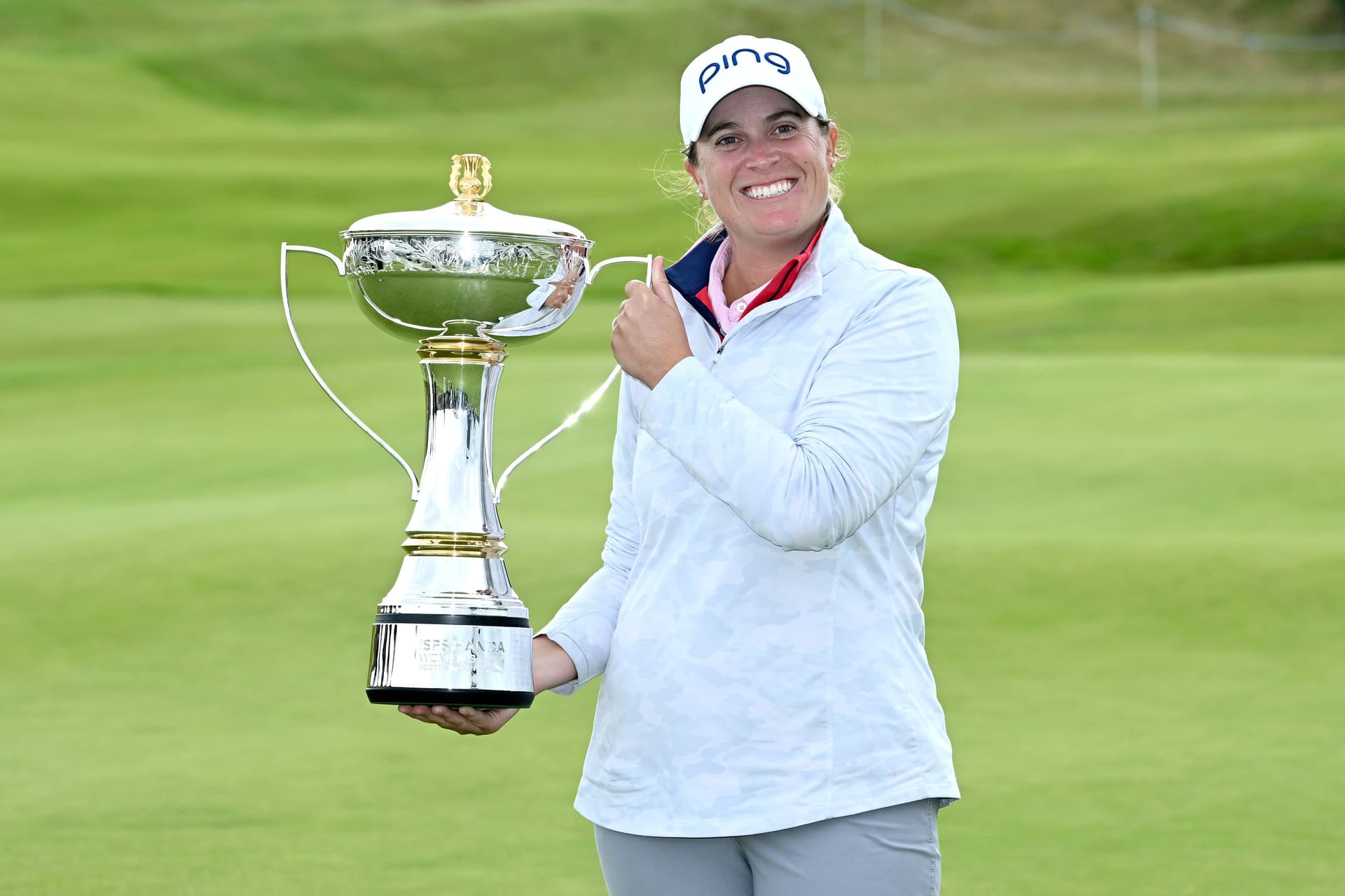 Lauren Coughlin of United States pose for a photo with the trophy