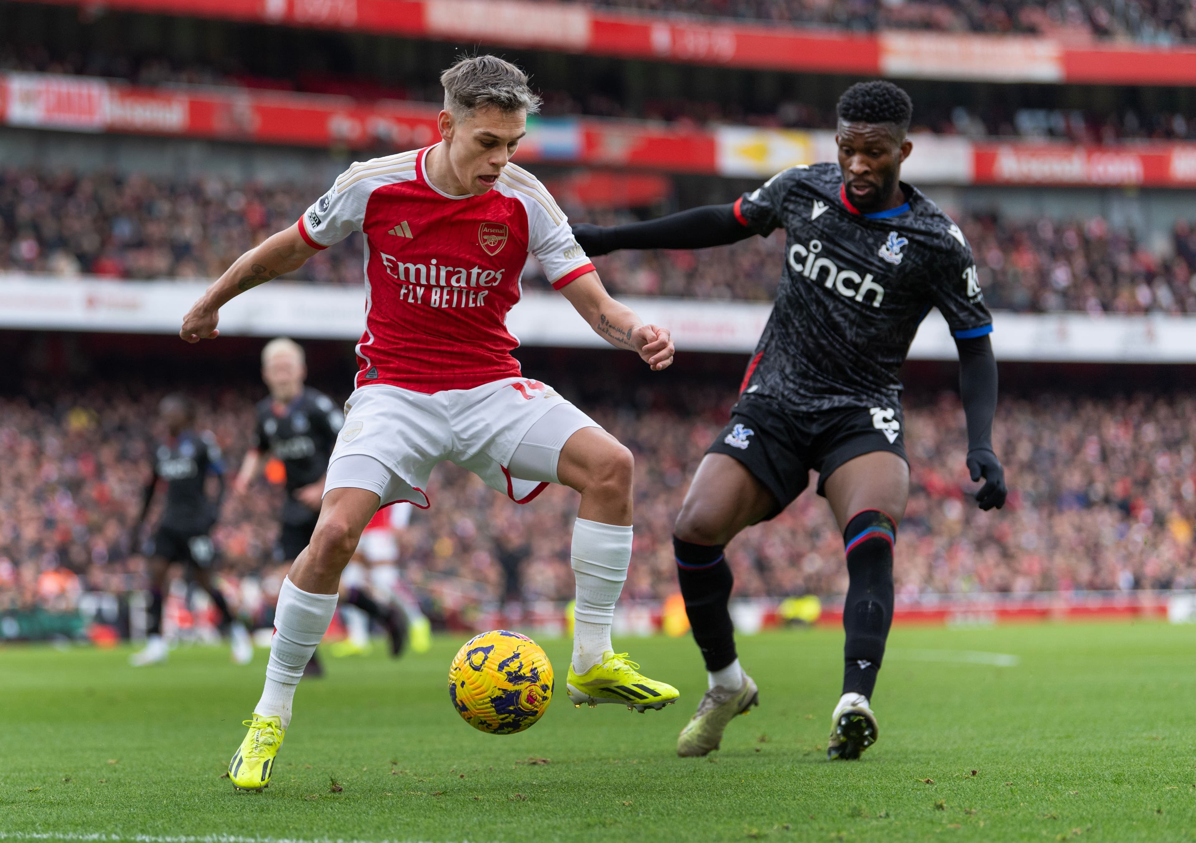 Leandro Trossard of Arsenal and Jefferson Lerma of Crystal Palace