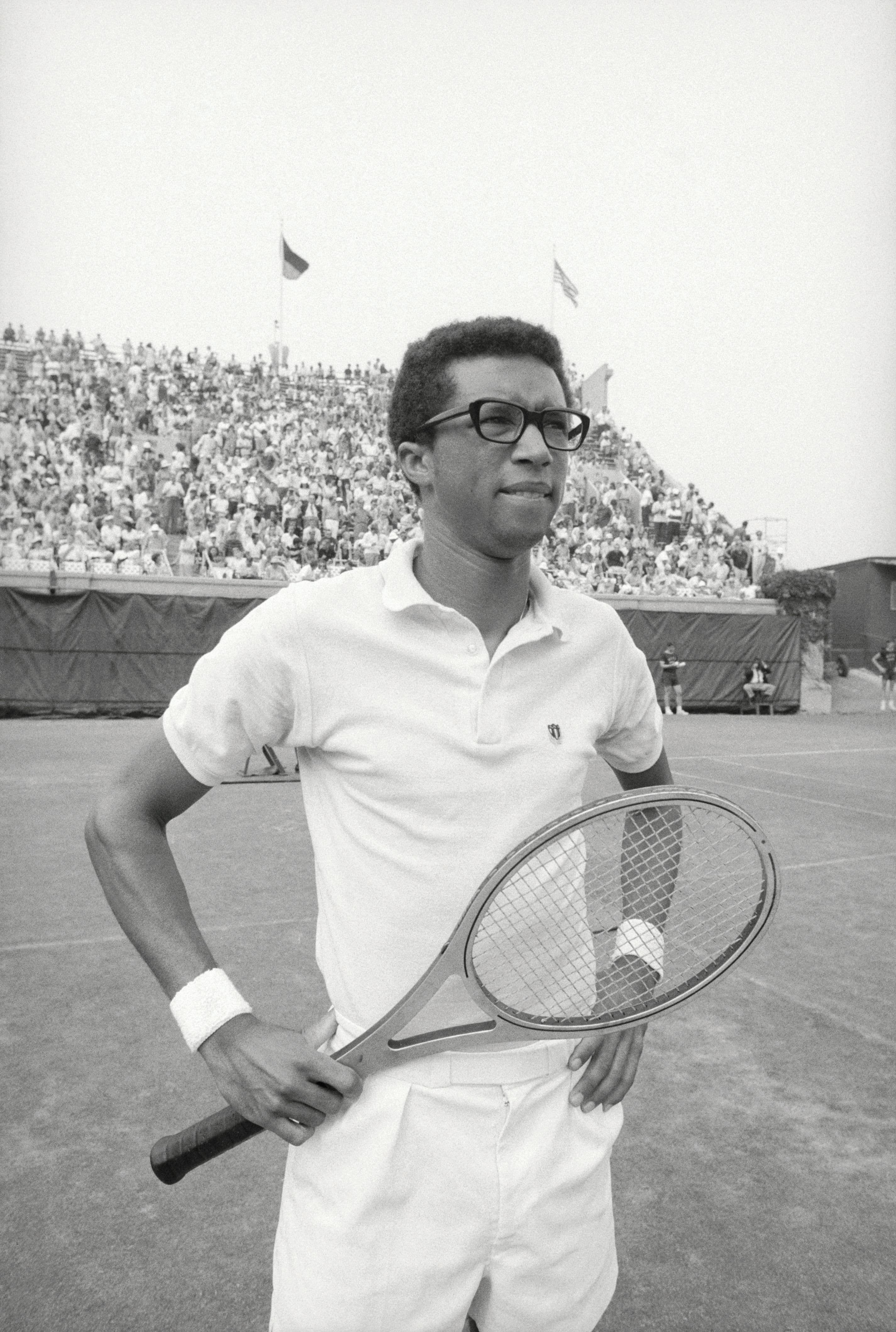 Legendary Tennis Professional Arthur Ashe Holding Racquet