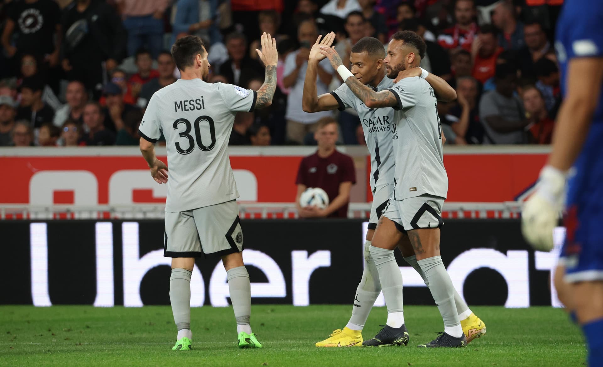 Lionel Messi, Neymar, and Kylian Mbappe celebrating