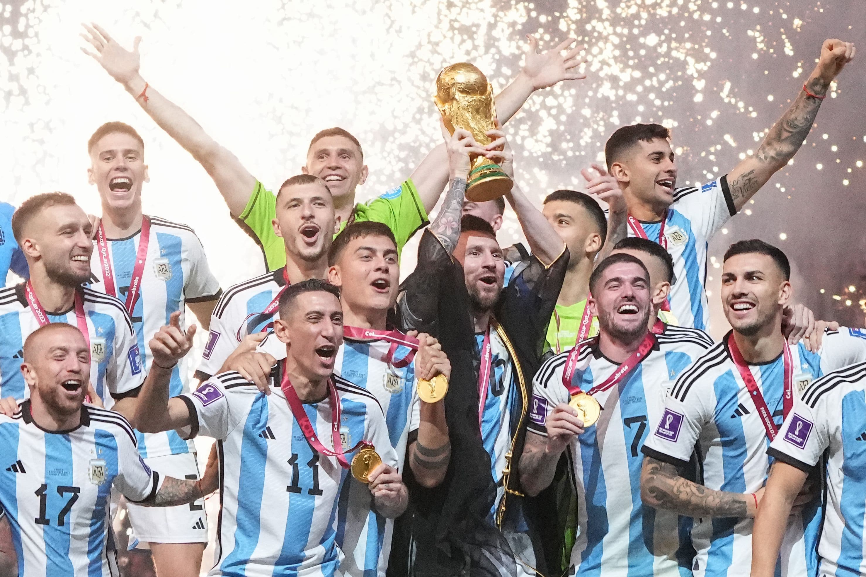 Lionel Messi of Argentina lifts the FIFA World Cup Trophy