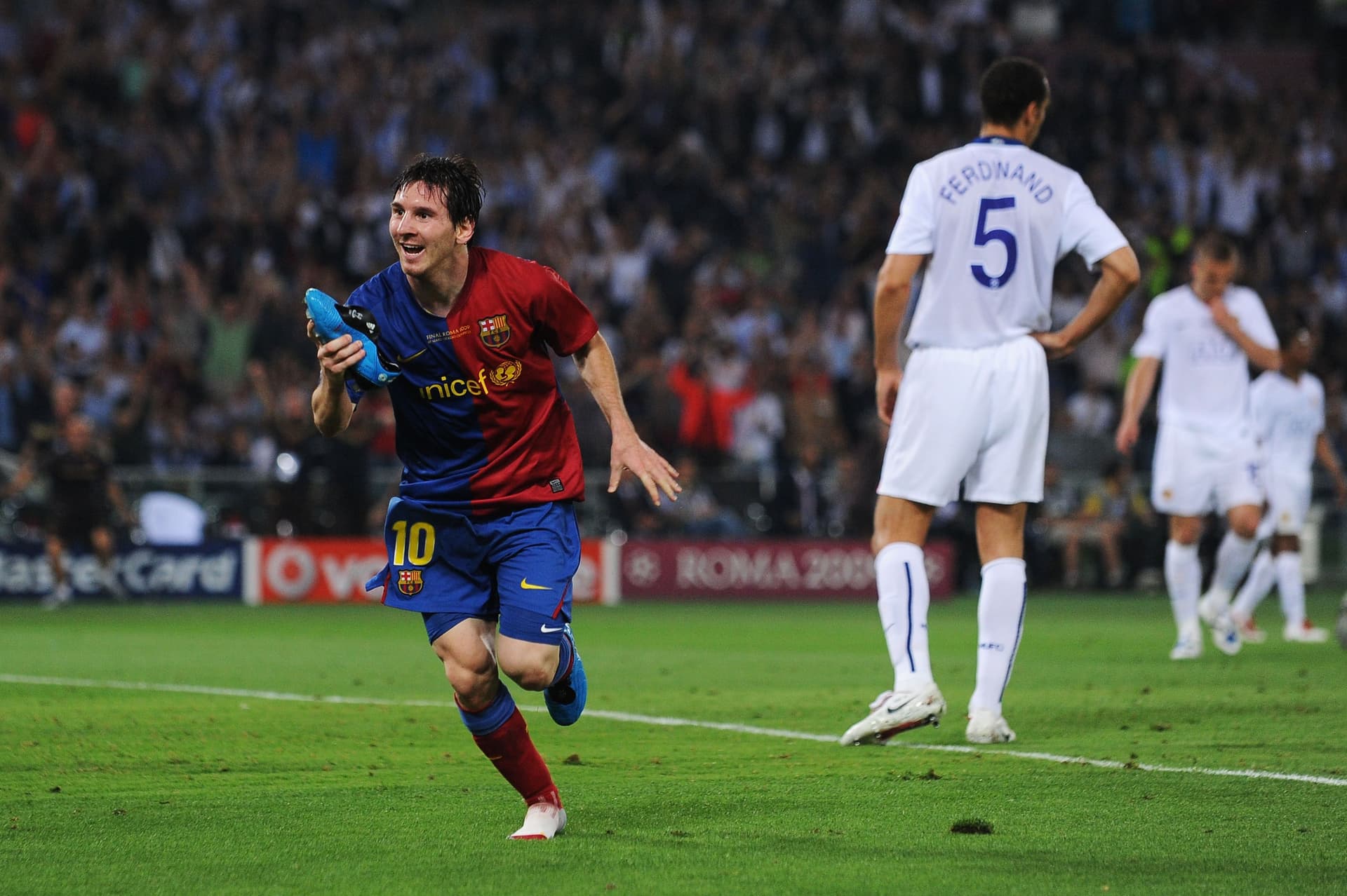 Lionel Messi celebrates scoring the second goal for Barcelona