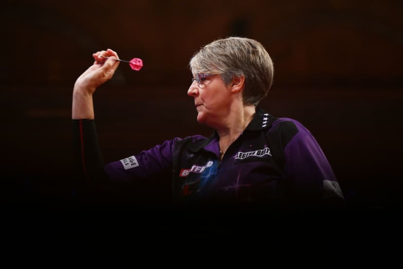 Lisa Ashton of England throws against Fallon Sherrock of England.jpg