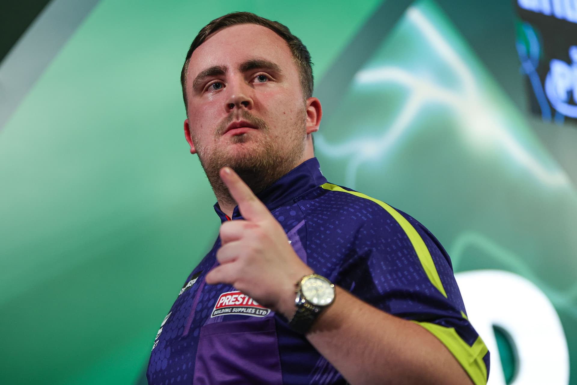 Luke Littler celebrating