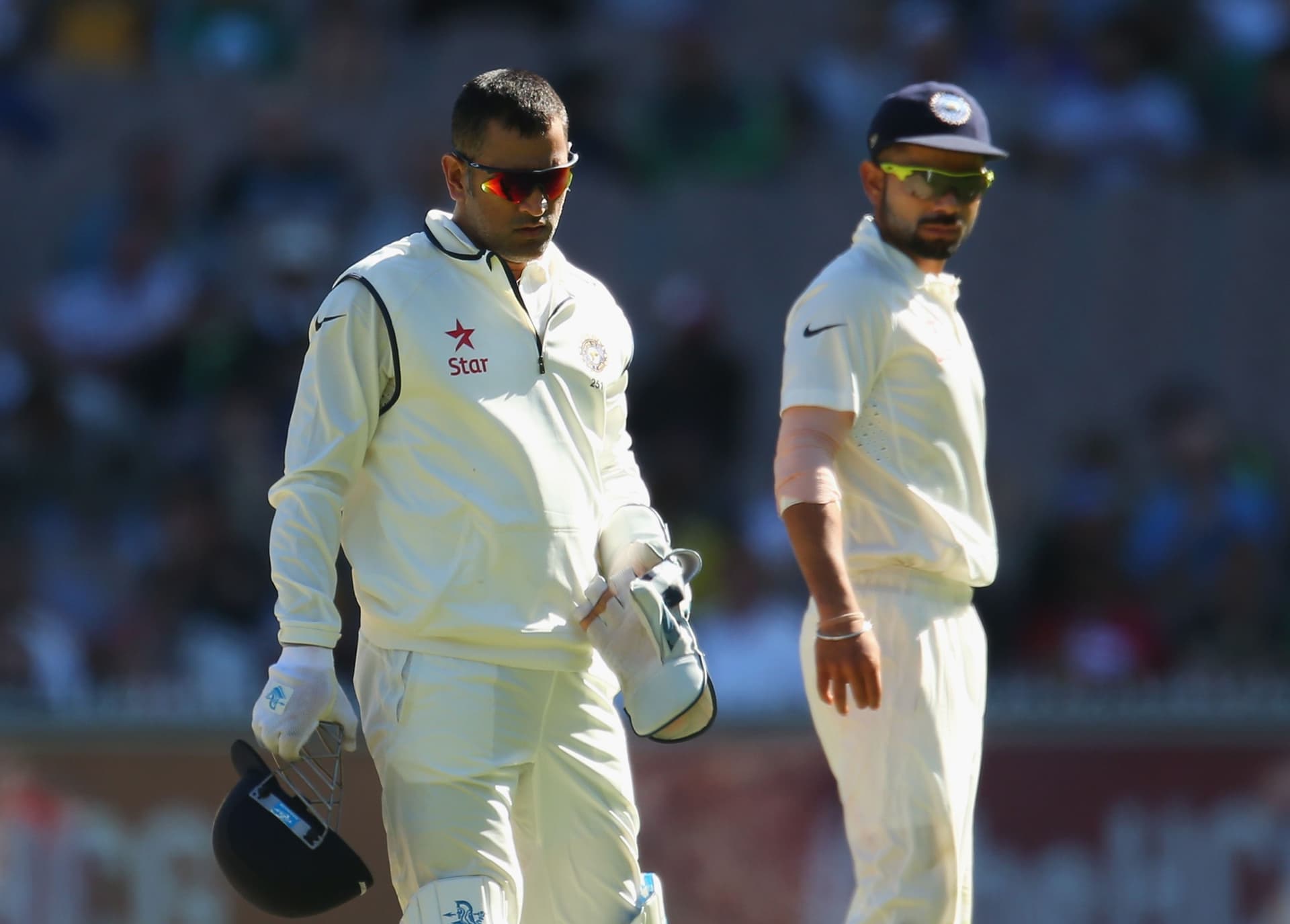 MS Dhoni and Virat Kohli of India look on in the field during day one of the Third Test match