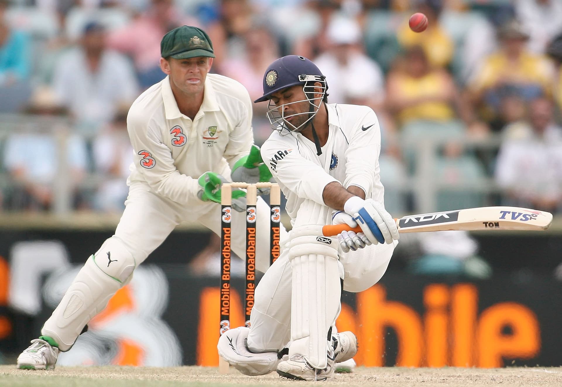 MS Dhoni of India attempts to sweep the ball during day three of the Third Test match