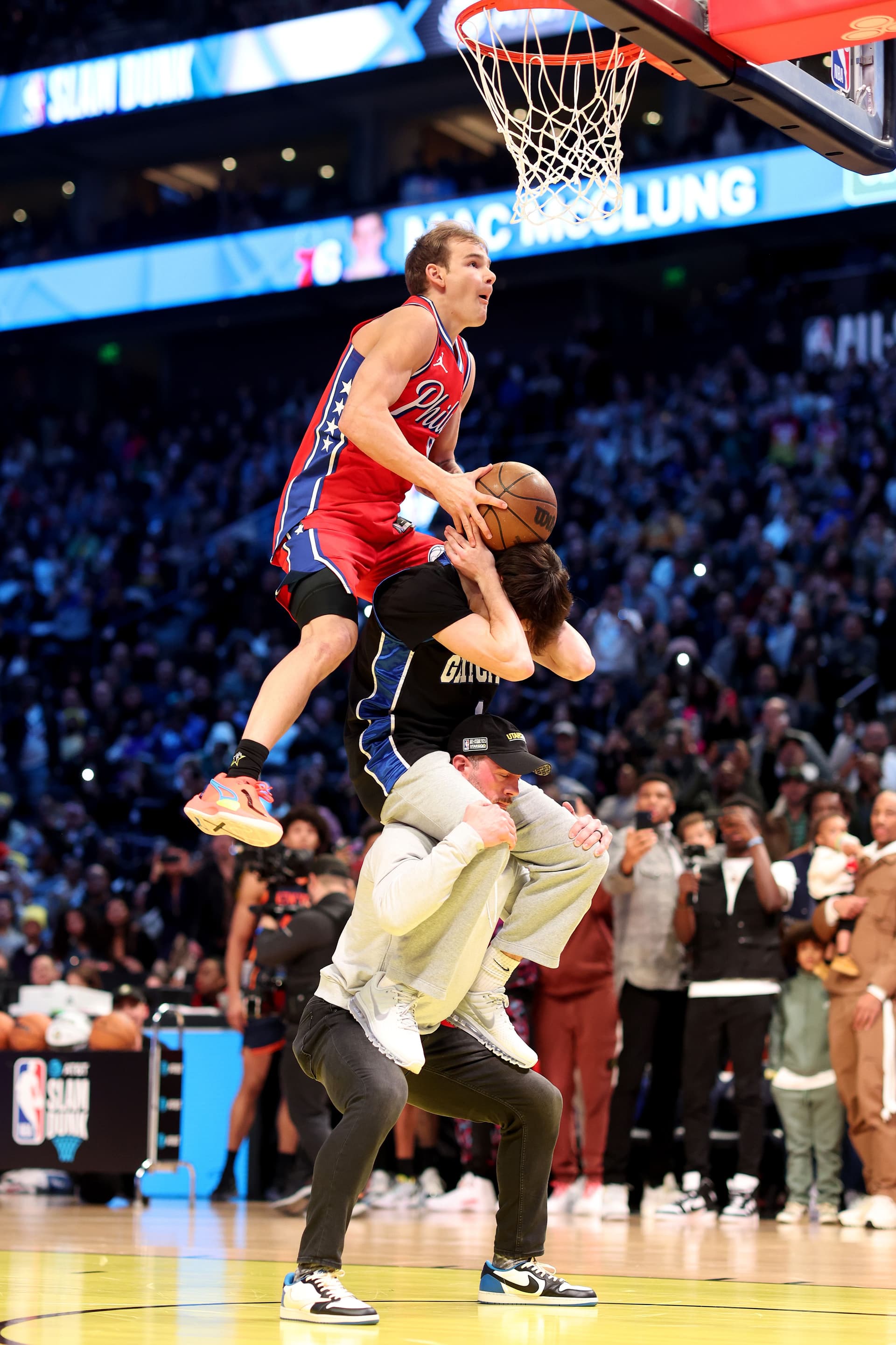 Mac McClung of the Philadelphia 76ers dunks the ball in the 2023 NBA All Star AT&T Slam Dunk Contest at Vivint Arena