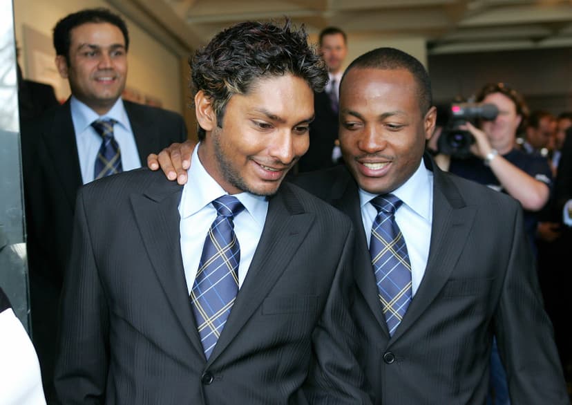 Members of the International Cricket Council (ICC) World XI cricket team, Kumar Sangakkara (L) and West Indies Brian Lara