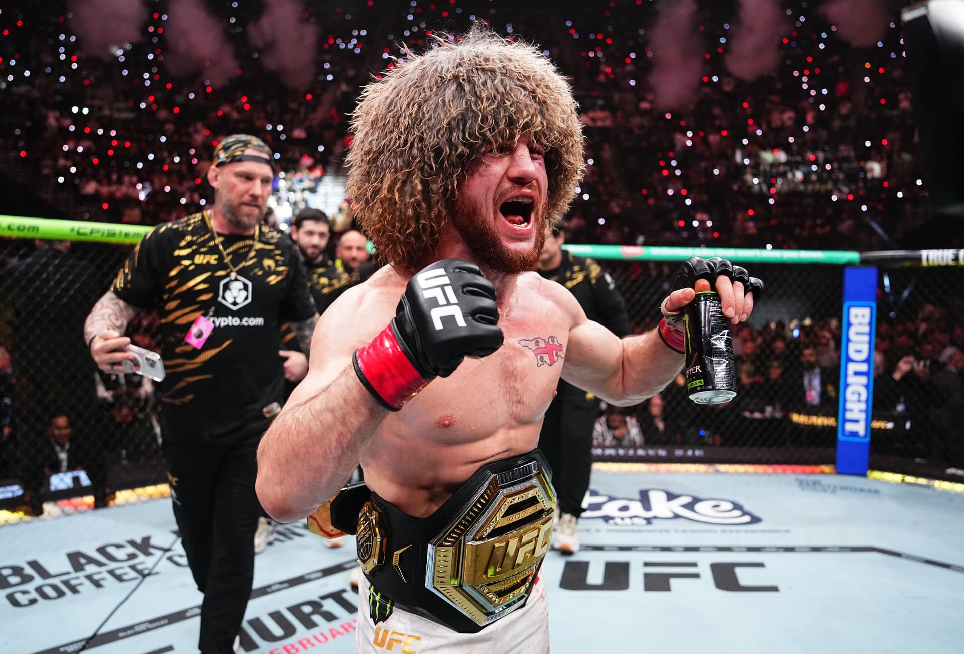 Merab Dvalishvili reacts after a decision victory against Umar Nurmagomedov