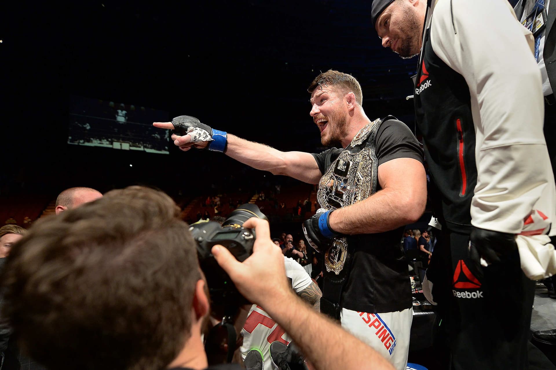 Michael Bisping leaves the ring after knocking out Luke Rockhol