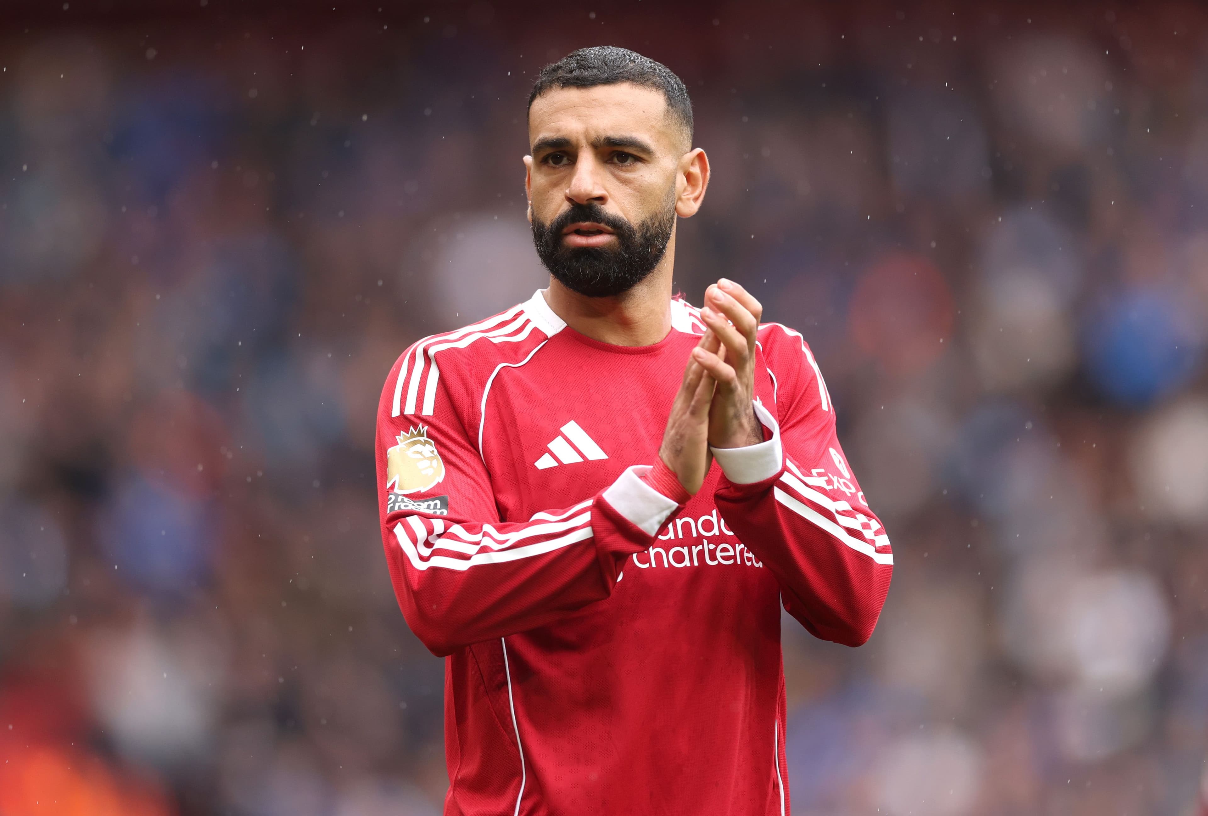 Mohamed Salah of Liverpool applauds the fans during the Premier League